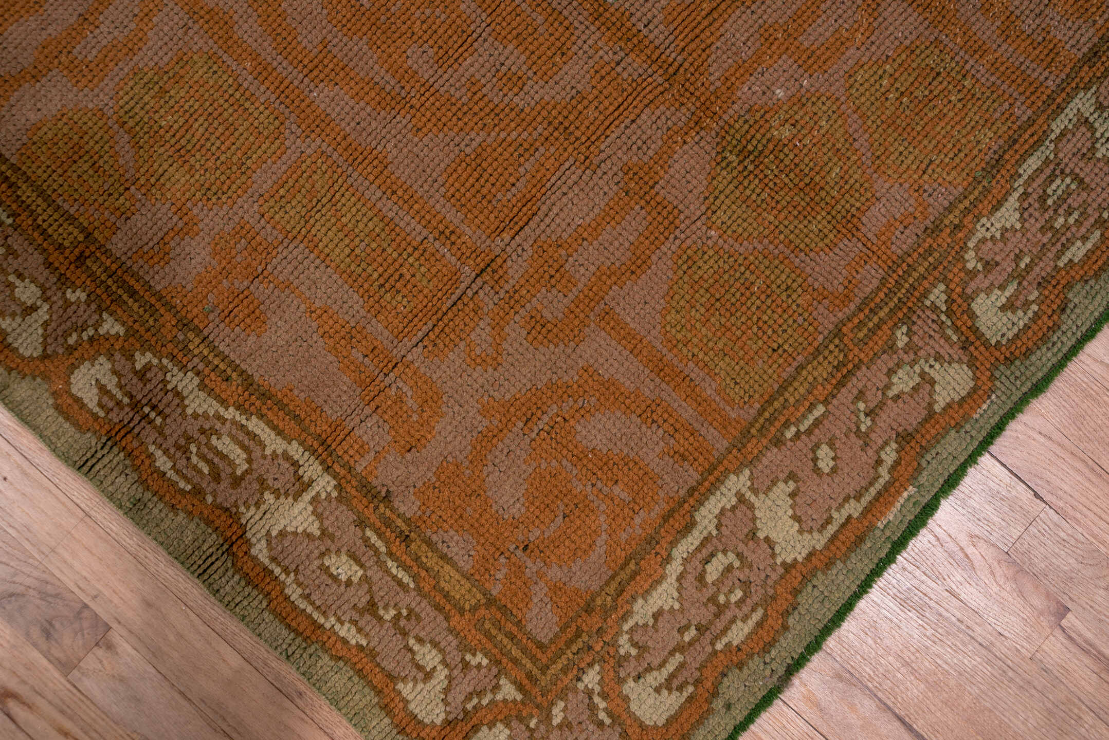 4' x 13' one-of-a-kind handmade handmade Donegal runner rug. Color palette: terra cotta, rust, taupe, olive, sage, brown