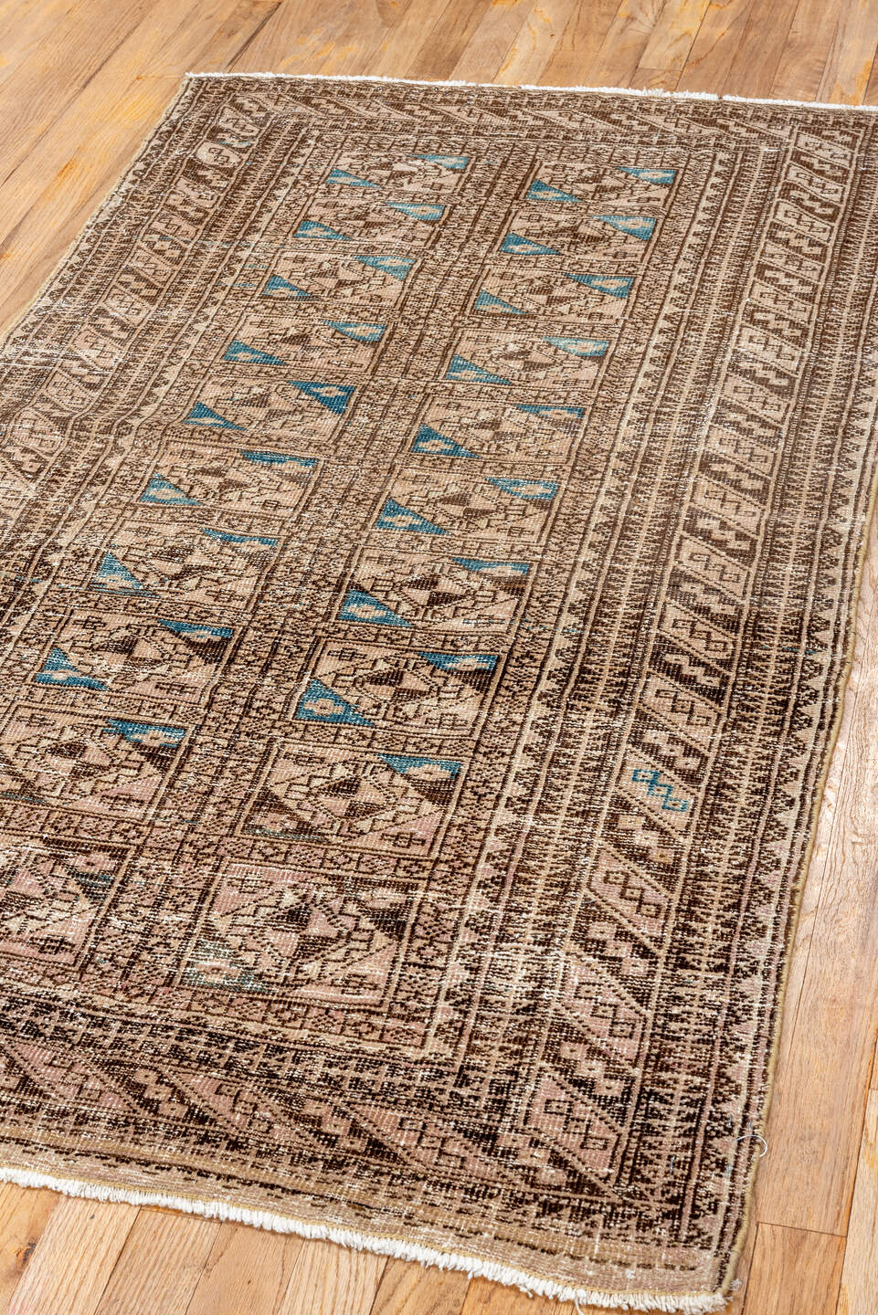 3' x 5' one-of-a-kind handmade antique Belouch small size rug. Color palette: camel, ivory, brown, sky_blue, taupe, beige