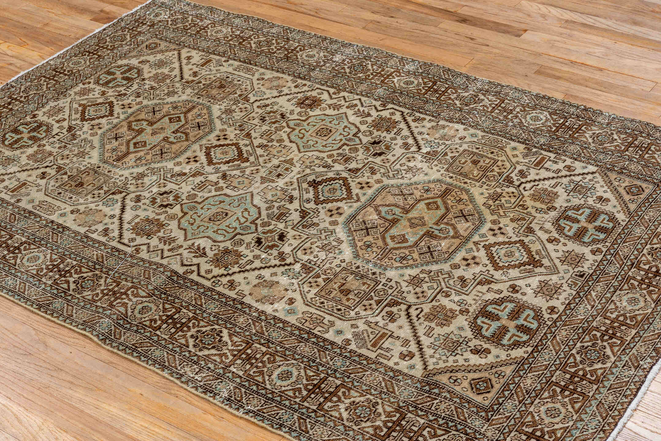 4' x 6' one-of-a-kind handmade vintage Ardebil small size rug. Color palette: ivory, brown, sky_blue, taupe, camel, charcoal