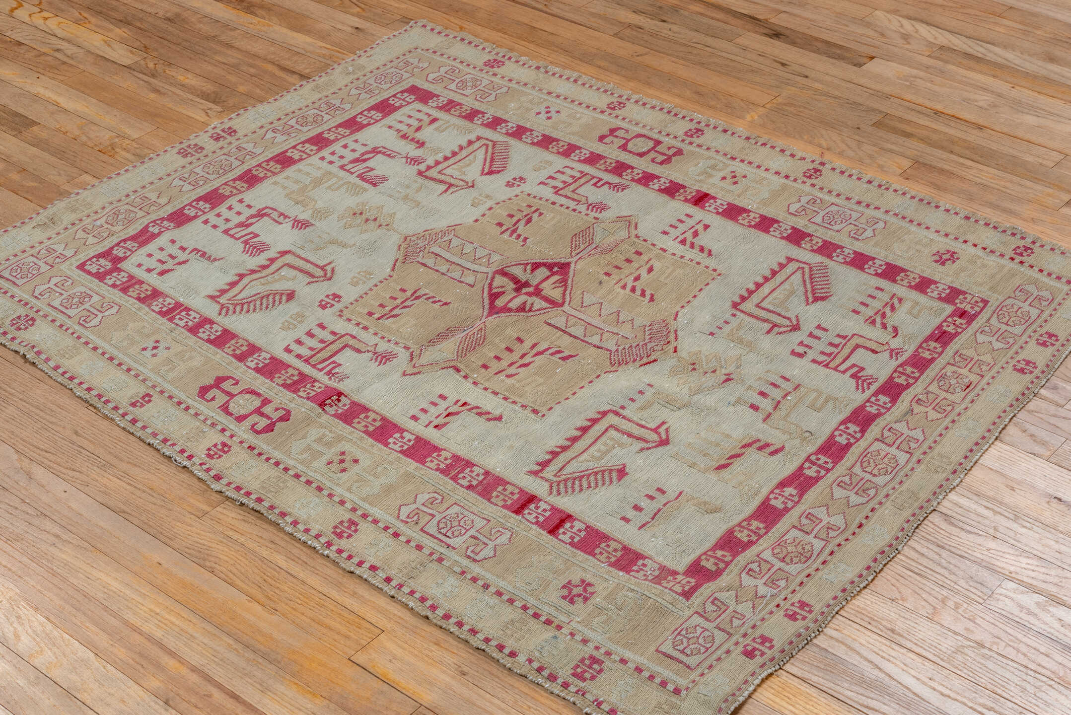 3' x 4' one-of-a-kind handmade antique Sumak small size rug. Color palette: ivory, camel, raspberry, beige, rose, red, pink
