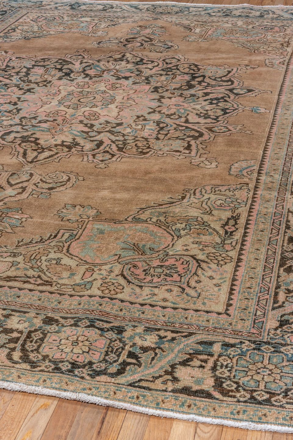 9' x 11' one-of-a-kind handmade antique Heriz large size rug. Color palette: camel, charcoal, ivory, pale blue, blush, taupe