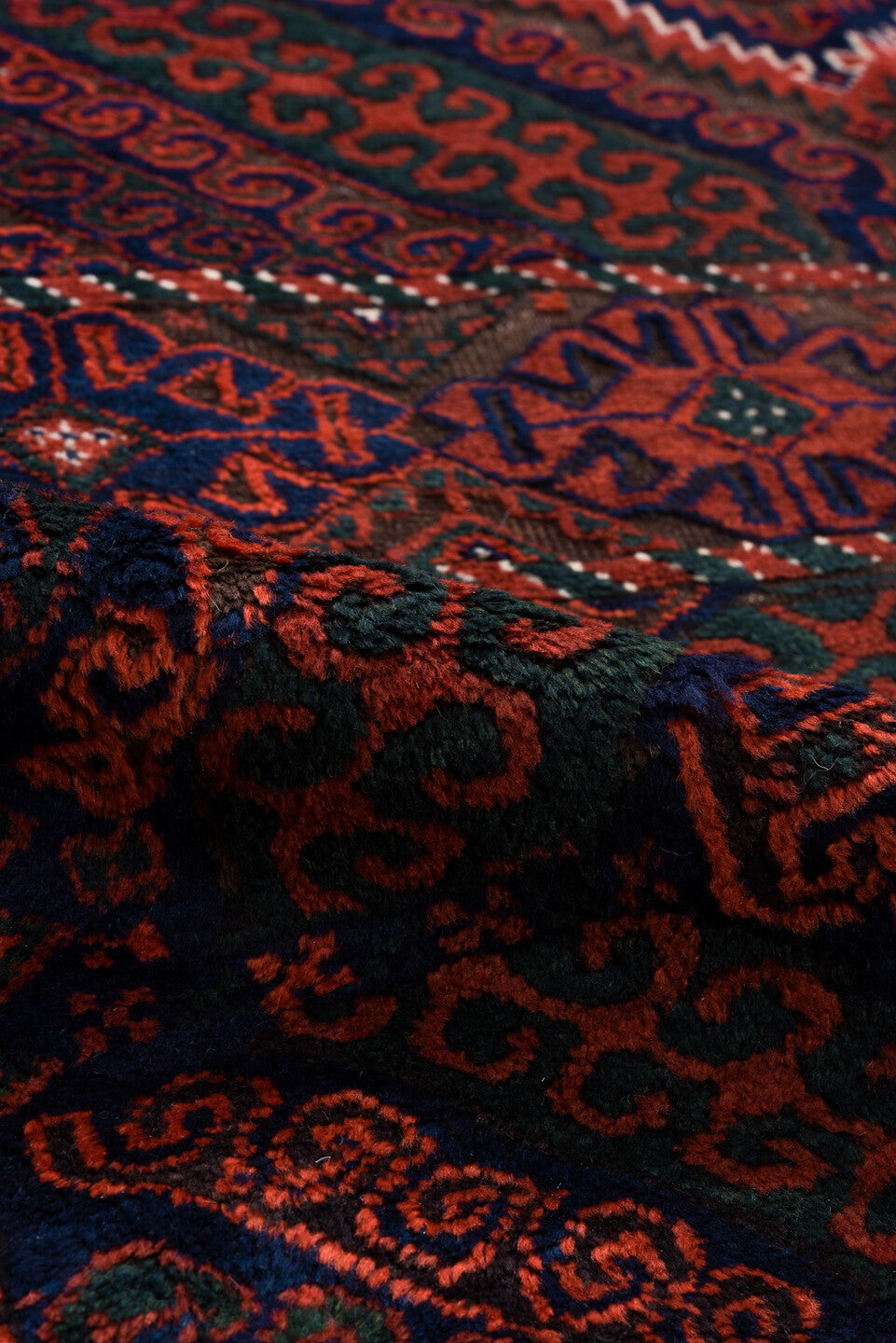 3' x 8' one-of-a-kind handmade vintage Belouch runner rug. Color palette: crimson, black, burgundy, ivory, charcoal, red