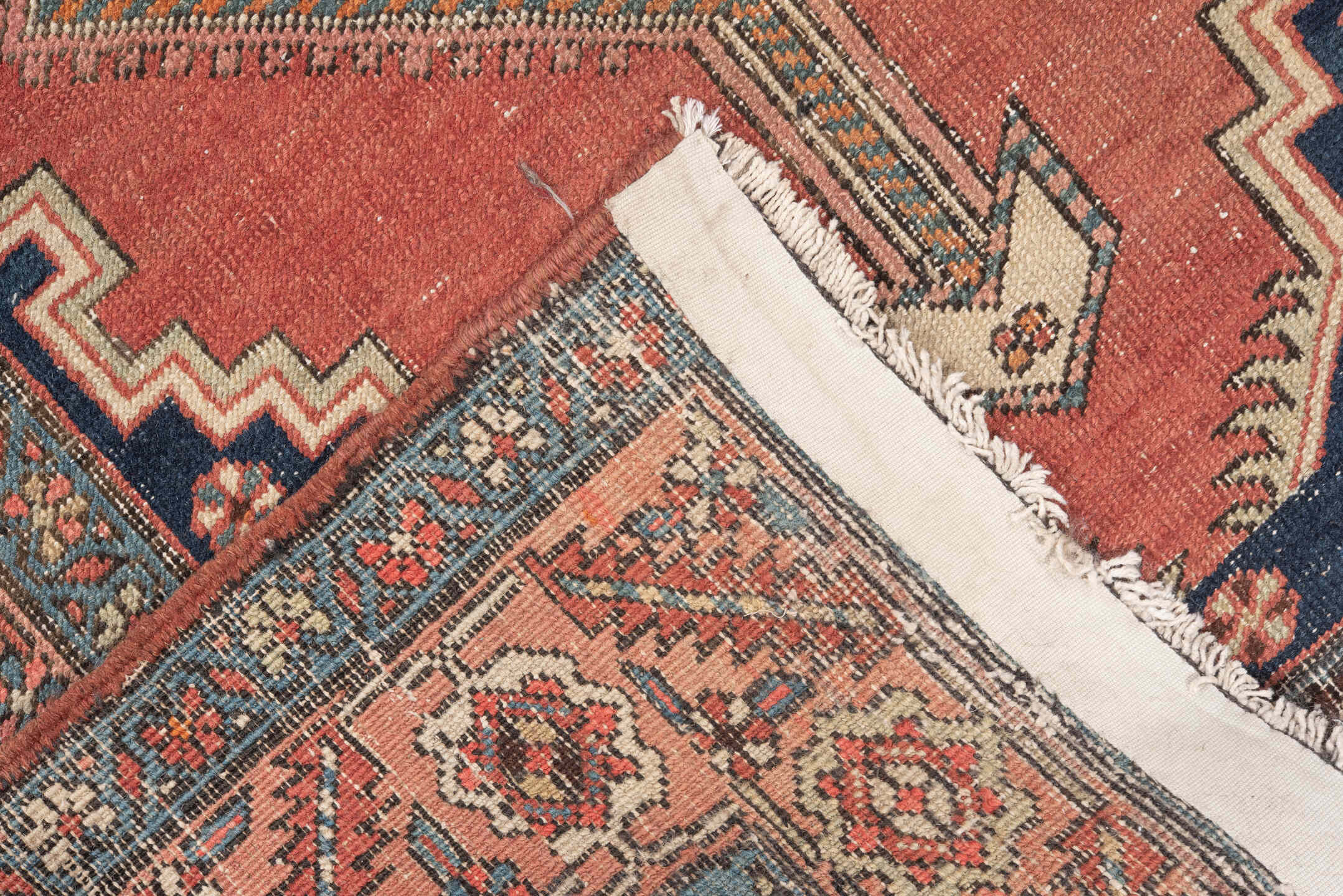 3' x 12' one-of-a-kind handmade antique Serapi runner rug. Color palette: coral, navy, ivory, rose, slate, taupe, terracotta