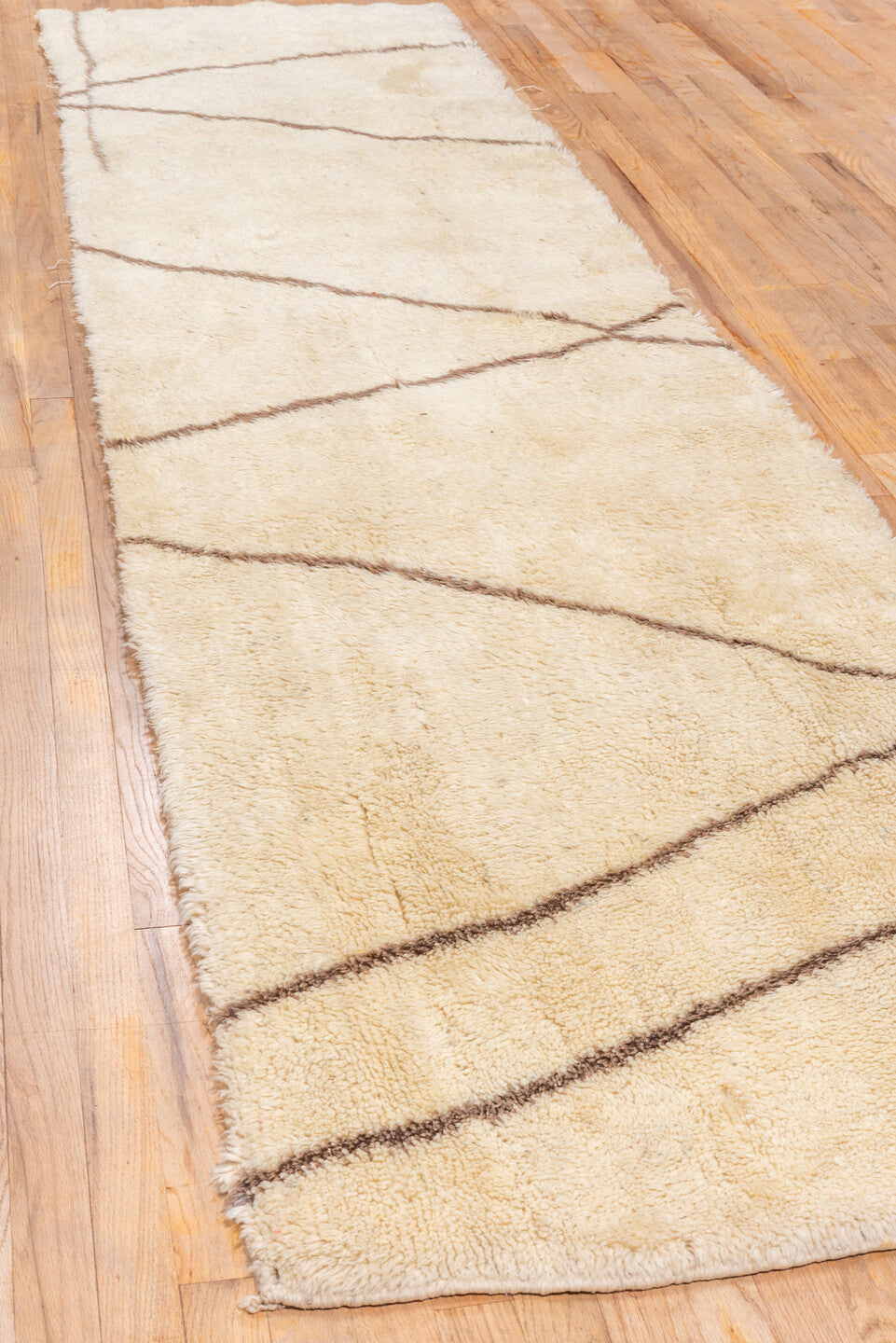 2' x 12' one-of-a-kind handmade vintage Moroccan runner rug. Color palette: brown, gray, light gray, linen, off-white, pink