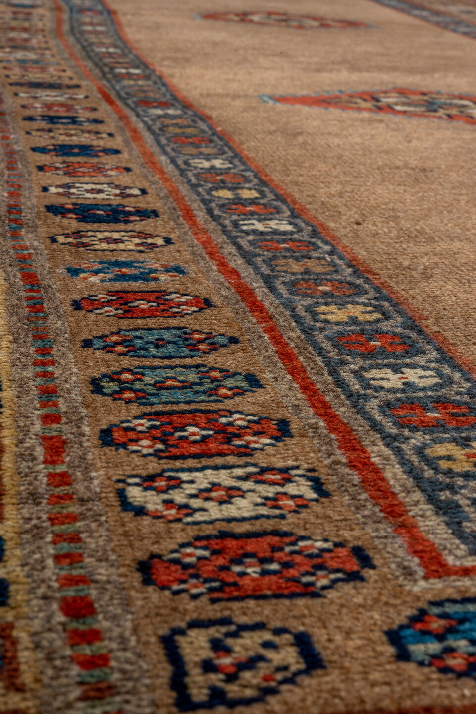 3' x 8' one-of-a-kind handmade vintage Sarab runner rug. Color palette: black, blue, brown, gray, pink, red