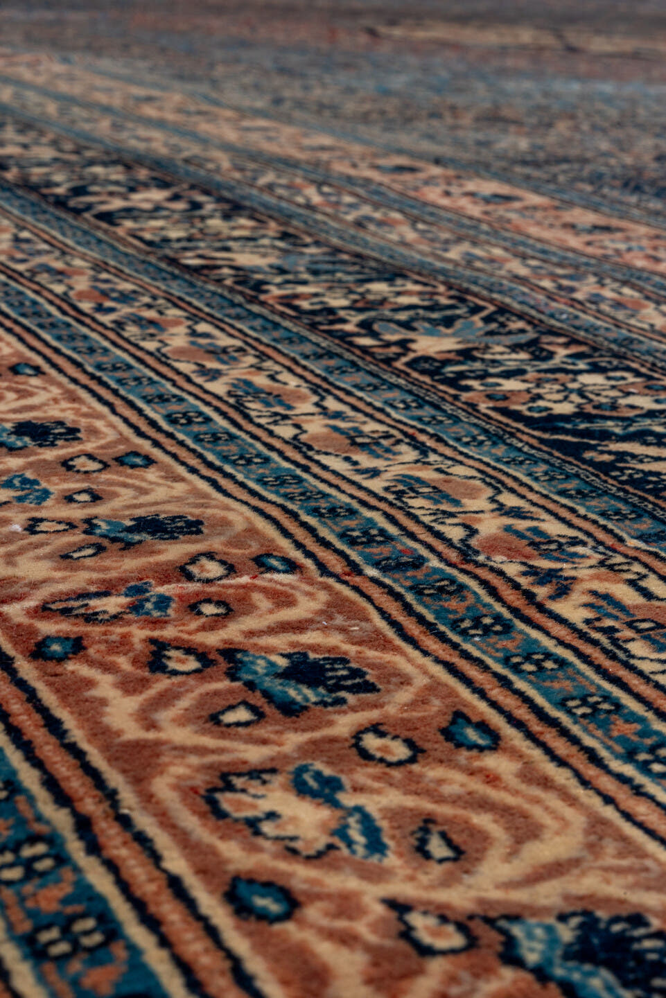 12' x 19' one-of-a-kind handmade antique Tabriz oversize rug. Color palette: navy, rust, ivory, terra cotta, indigo, camel