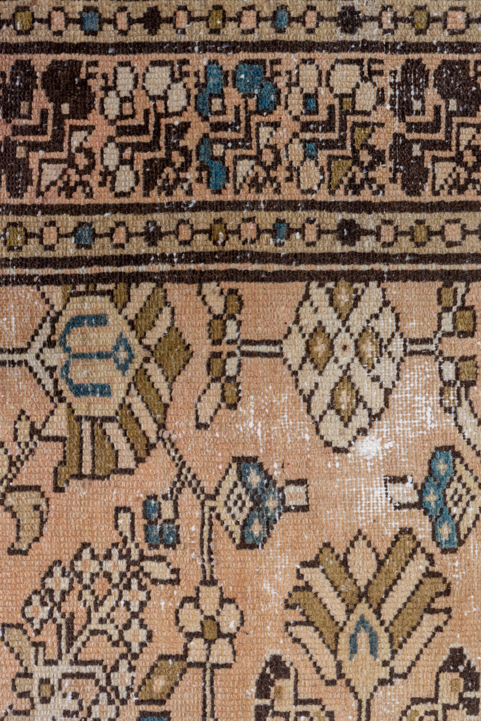 5' x 9' one-of-a-kind handmade vintage Distressed medium size rug. Color palette: tan, ivory, brown, muted blue, taupe