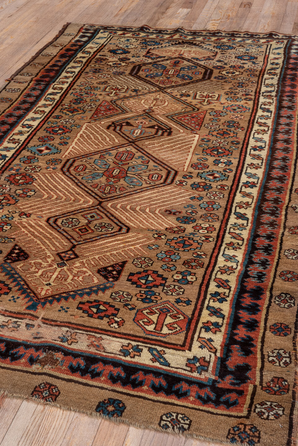 4' x 8' one-of-a-kind handmade antique Sarab runner rug. Color palette: camel, taupe, ivory, rust, indigo, brown, slate