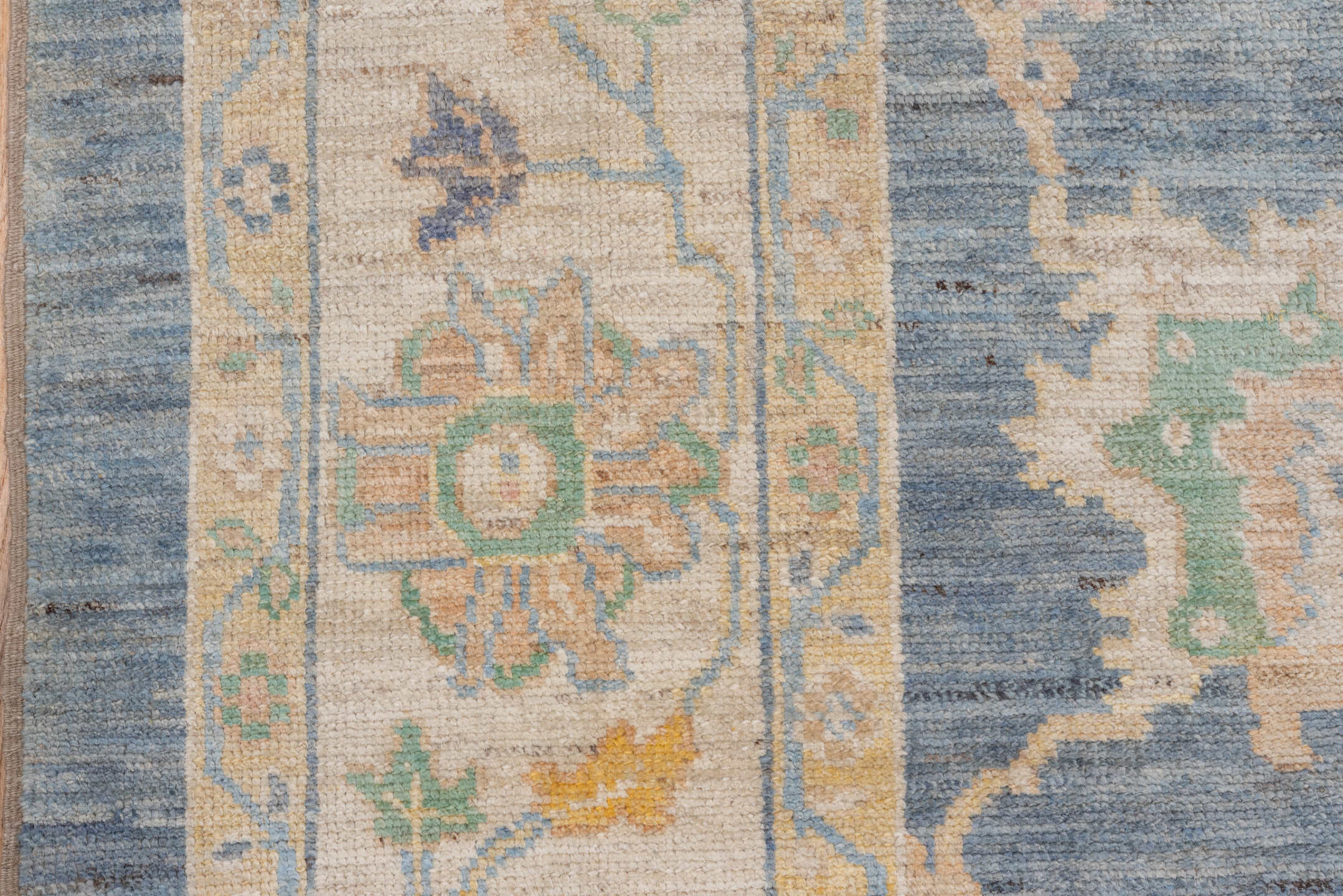 8' x 9' one-of-a-kind handmade vintage Oushak rug. Color palette: light blue, ivory, cream, sage, gold, taupe, pale aqua
