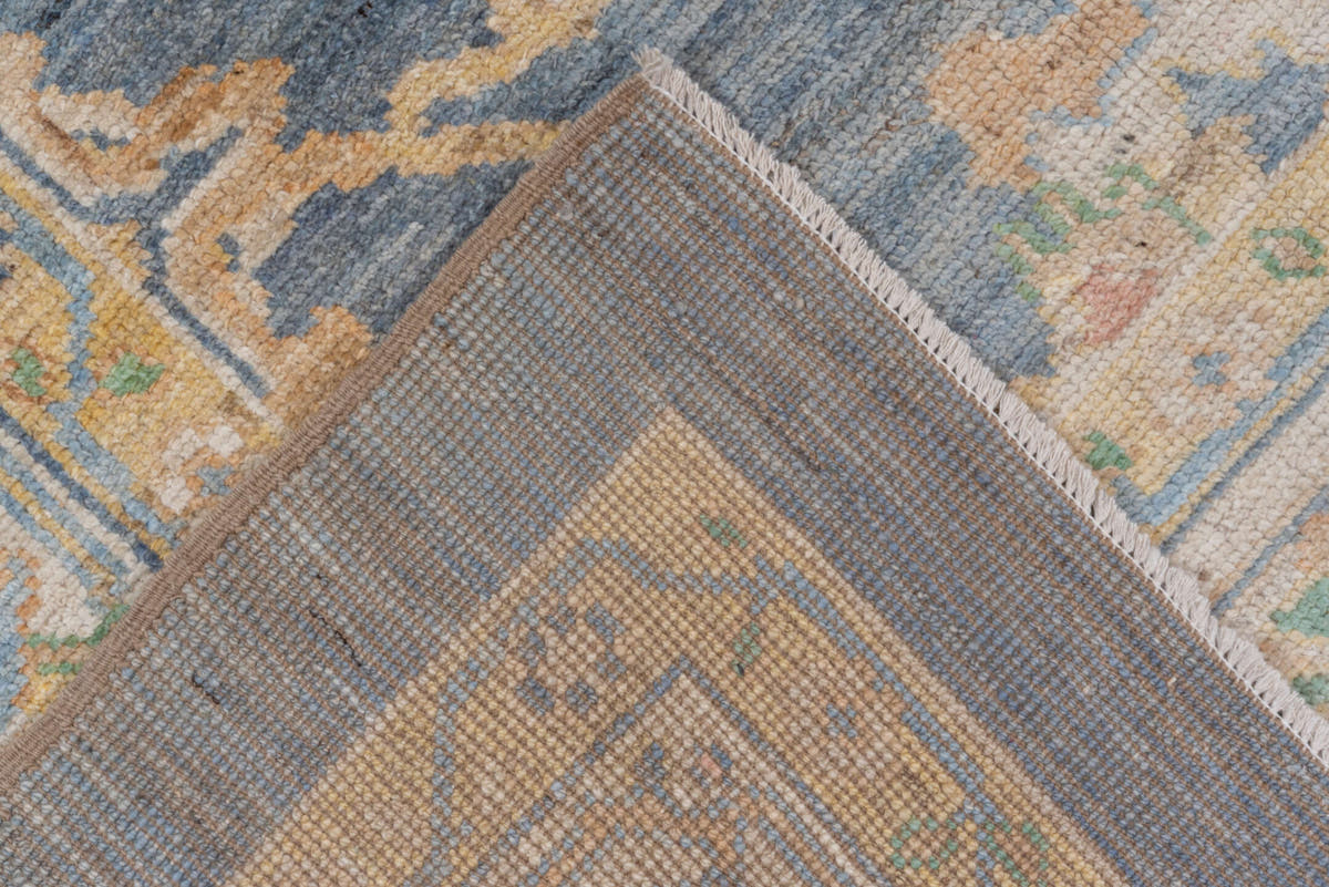 8' x 9' one-of-a-kind handmade vintage Oushak rug. Color palette: light blue, ivory, cream, sage, gold, taupe, pale aqua
