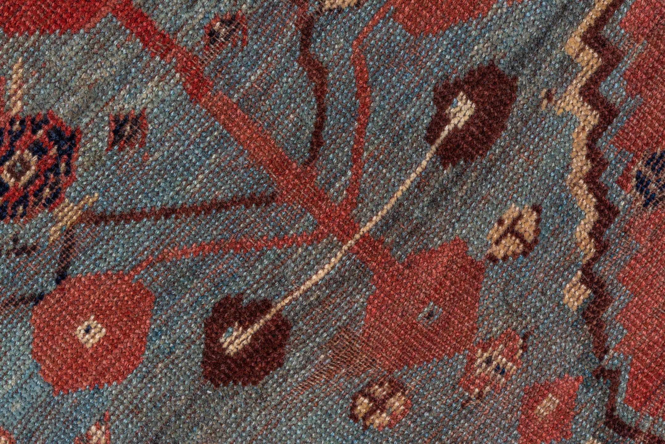 5' x 8' one-of-a-kind handmade antique Qashqai medium size rug. Color palette: rust, indigo, ivory, slate, terra cotta