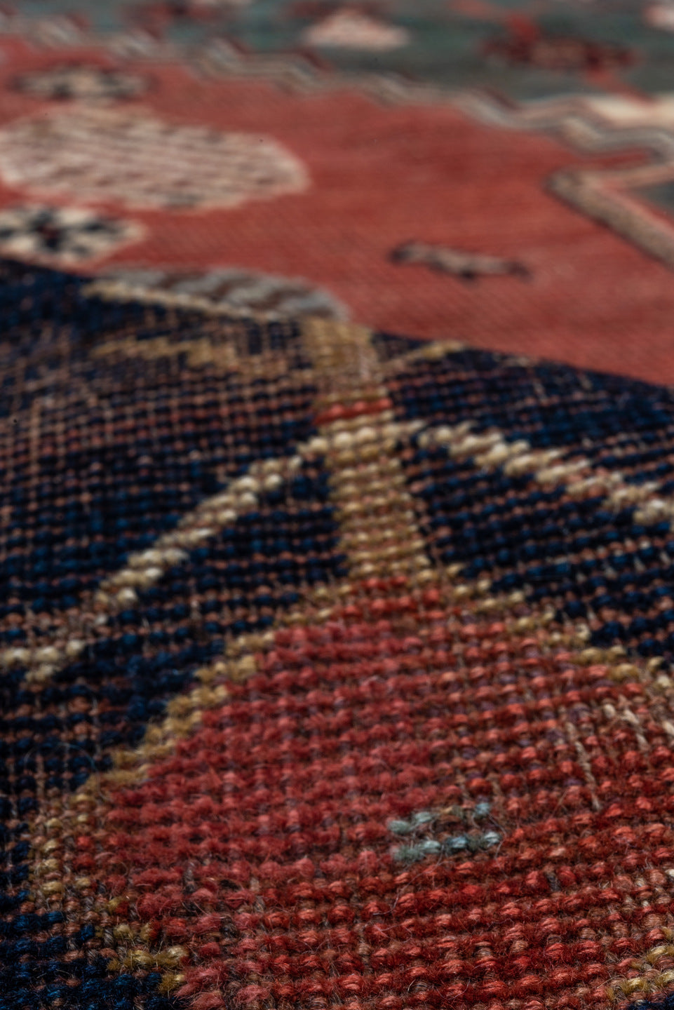 5' x 8' one-of-a-kind handmade antique Qashqai medium size rug. Color palette: rust, indigo, ivory, slate, terra cotta