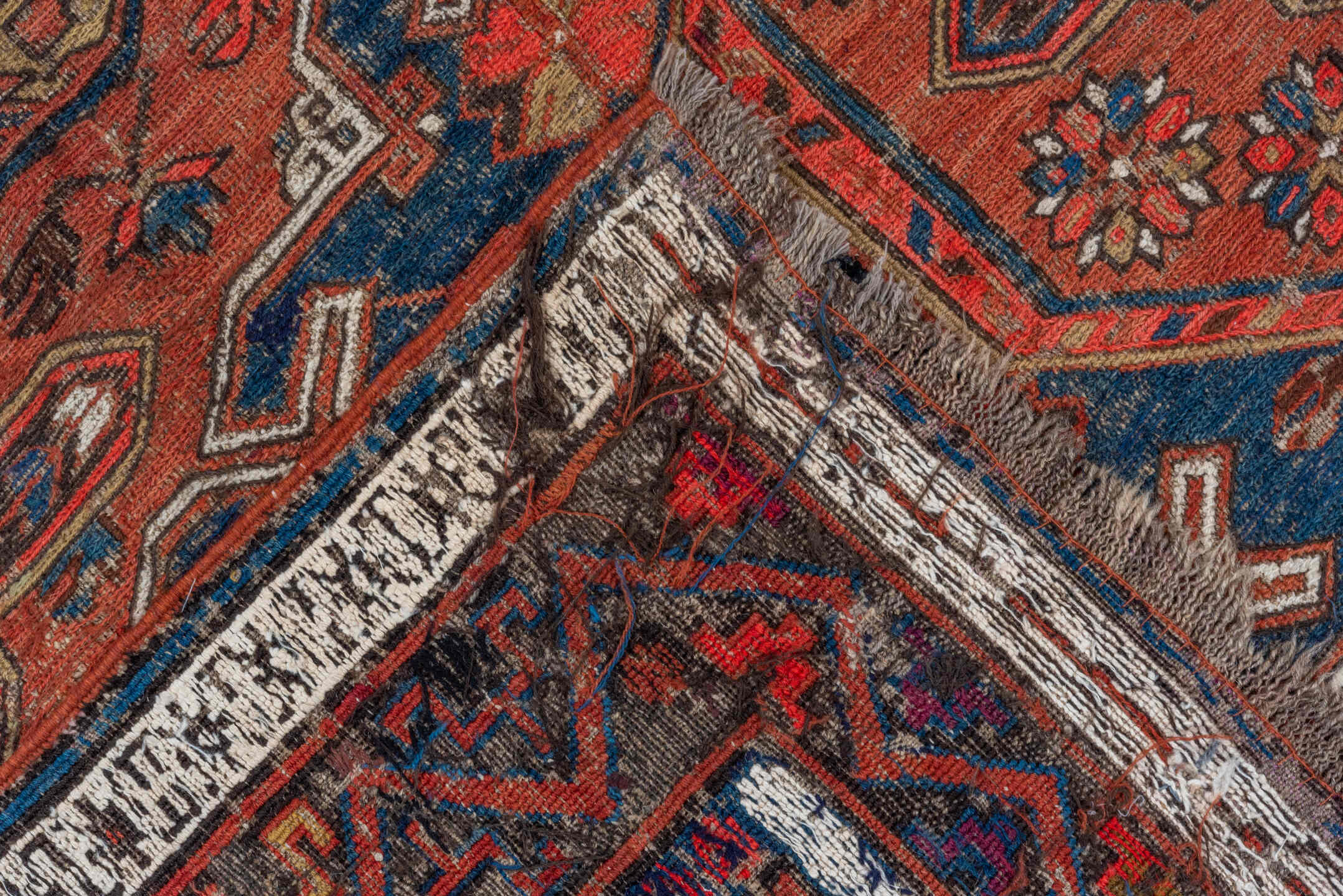 6' x 9' one-of-a-kind handmade vintage Sumak medium size rug. Color palette: blue, brown, dark gray, gray, indian red, pink
