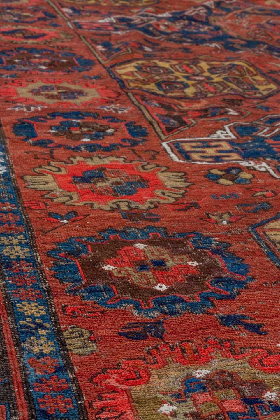 6' x 9' one-of-a-kind handmade vintage Sumak medium size rug. Color palette: blue, brown, dark gray, gray, indian red, pink