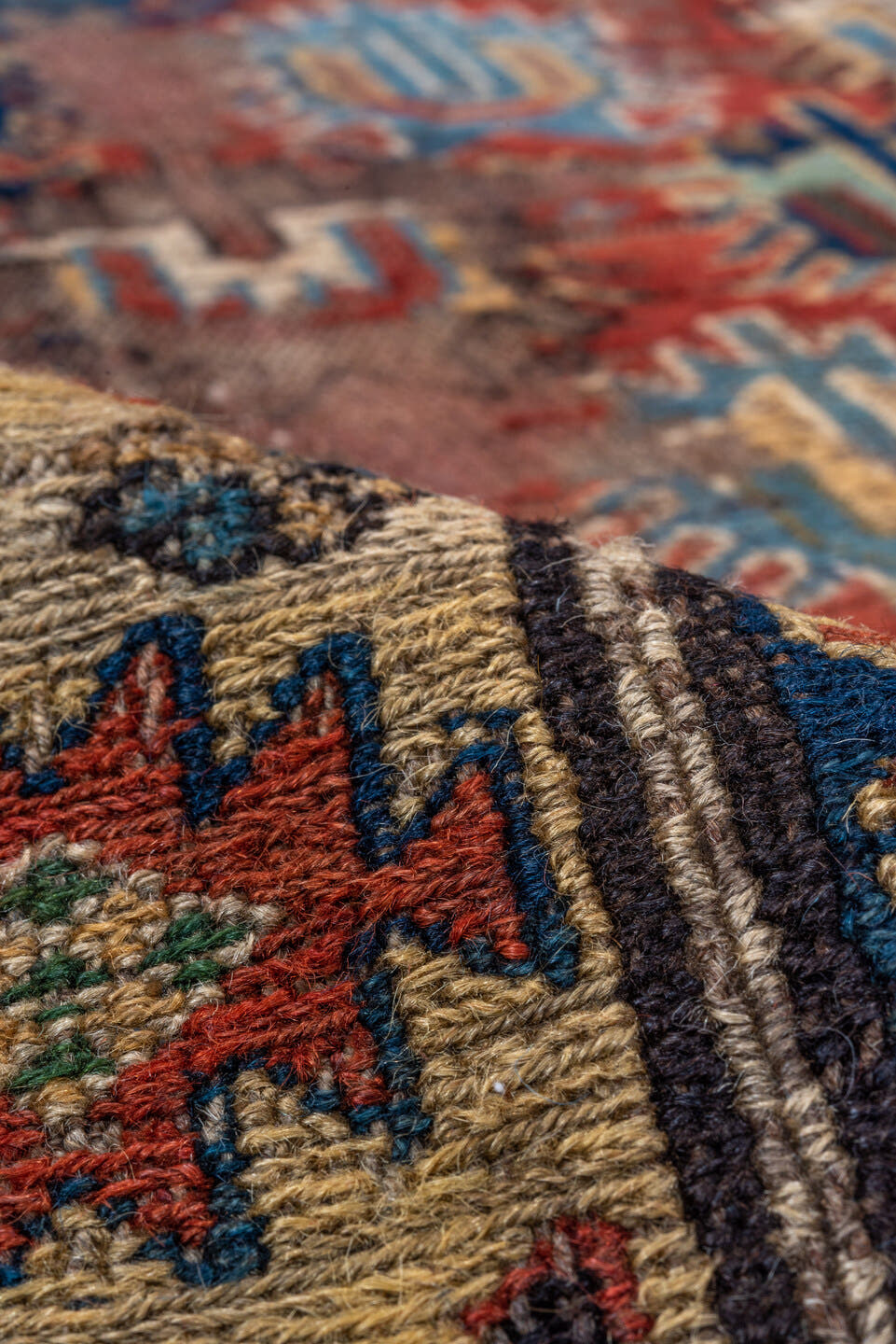 3' x 7' one-of-a-kind handmade antique Sumak runner rug. Color palette: rust, ivory, navy, indigo, camel, gold, crimson