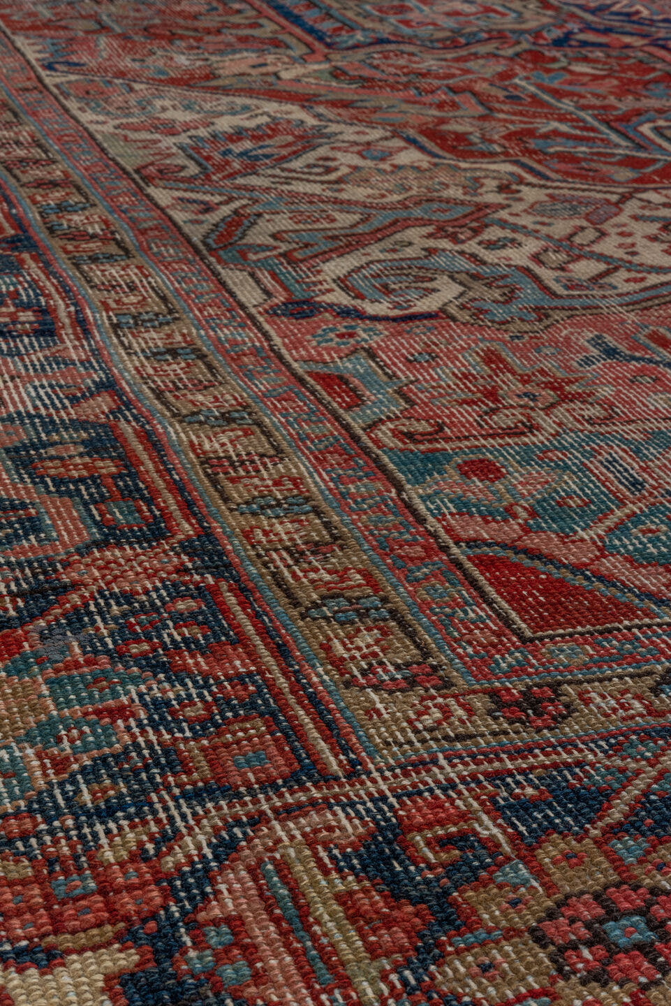 8' x 12' one-of-a-kind handmade antique Heriz large size rug. Color palette: brick red, ivory, navy, dusty teal, taupe, rose