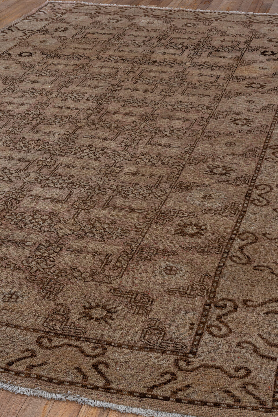 6' x 9' one-of-a-kind handmade antique Khotan medium size rug. Color palette: beige, taupe, brown, camel, ivory, gray