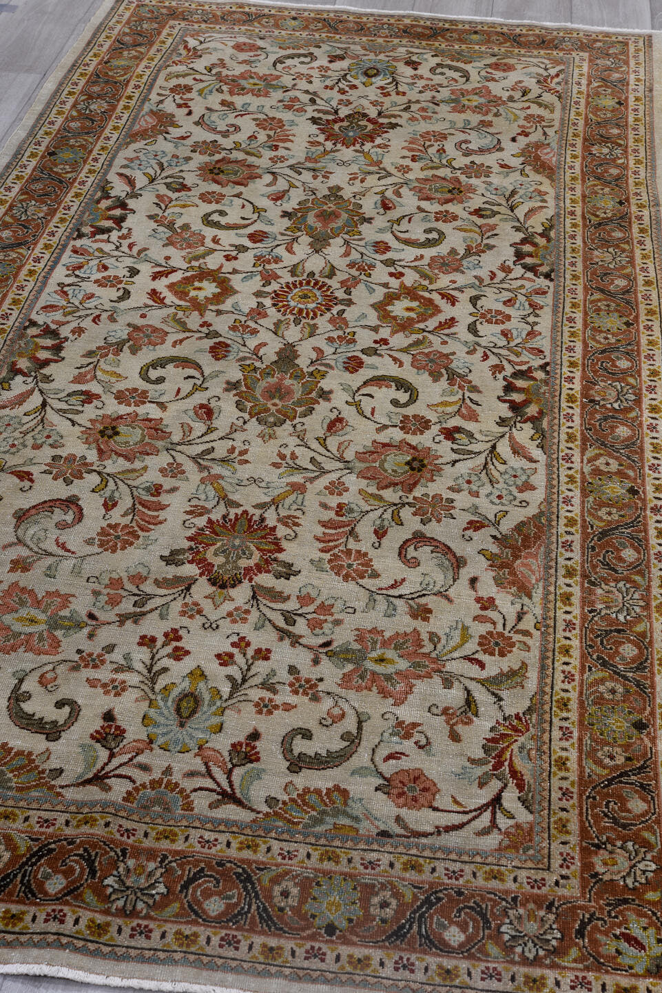 4' x 9' one-of-a-kind handmade antique Sarouk runner rug. Color palette: ivory, camel, rust, light blue, sage, gold, brown