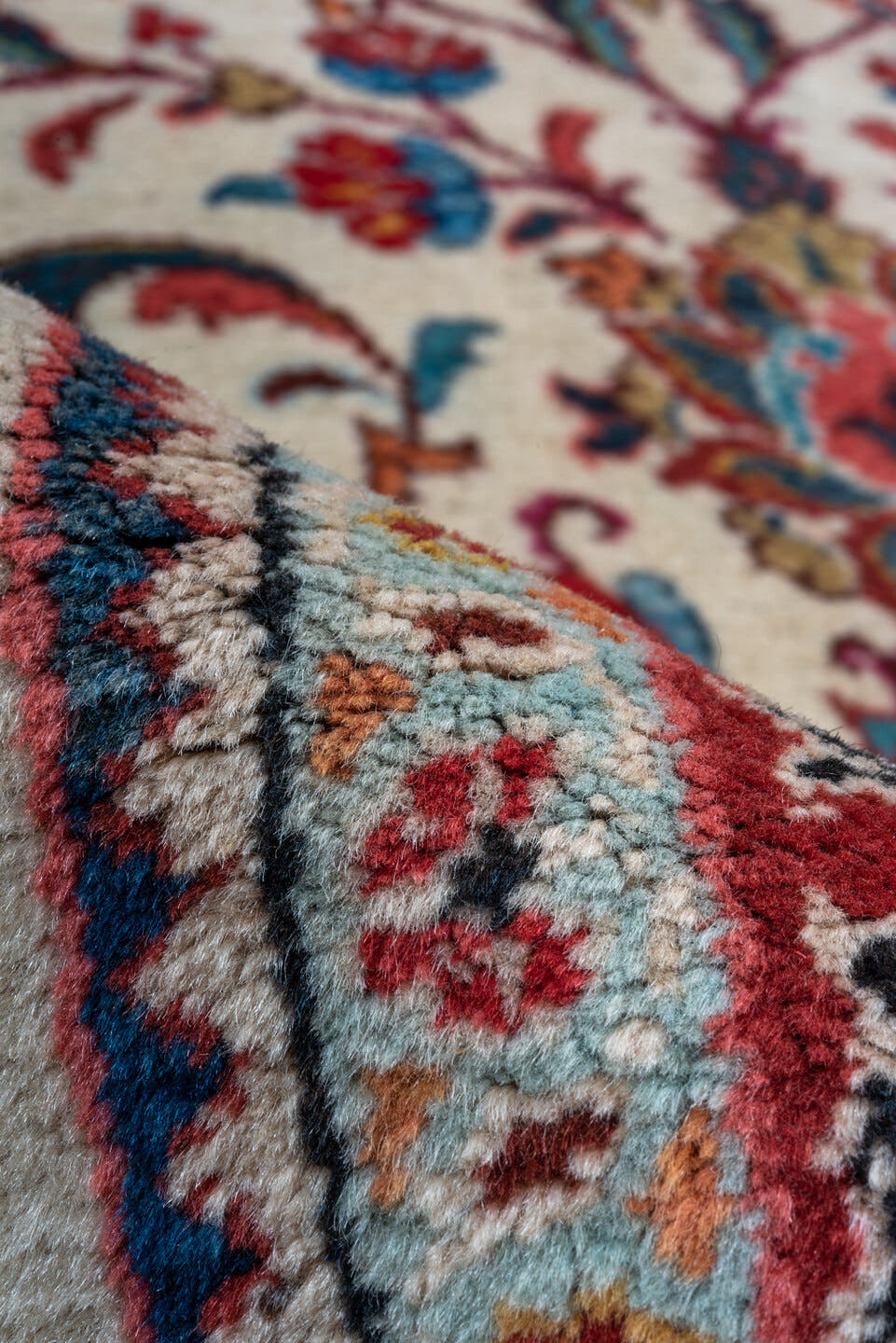 4' x 9' one-of-a-kind handmade antique Sarouk runner rug. Color palette: ivory, camel, rust, light blue, sage, gold, brown