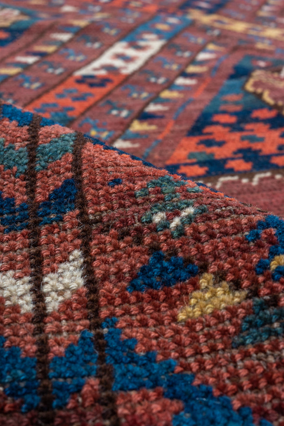 5' x 10' one-of-a-kind handmade antique Beshir medium size rug. Color palette: rust, navy, burgundy, ivory, terra cotta