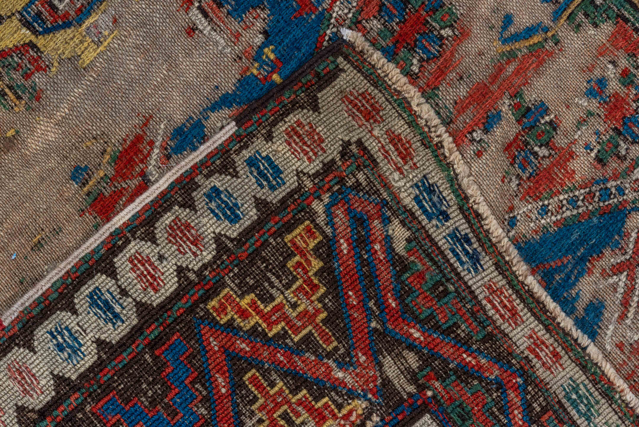 6' x 7' one-of-a-kind handmade antique Sumak rug. Color palette: ivory, indigo, rust, crimson, gold, charcoal, saffron, teal