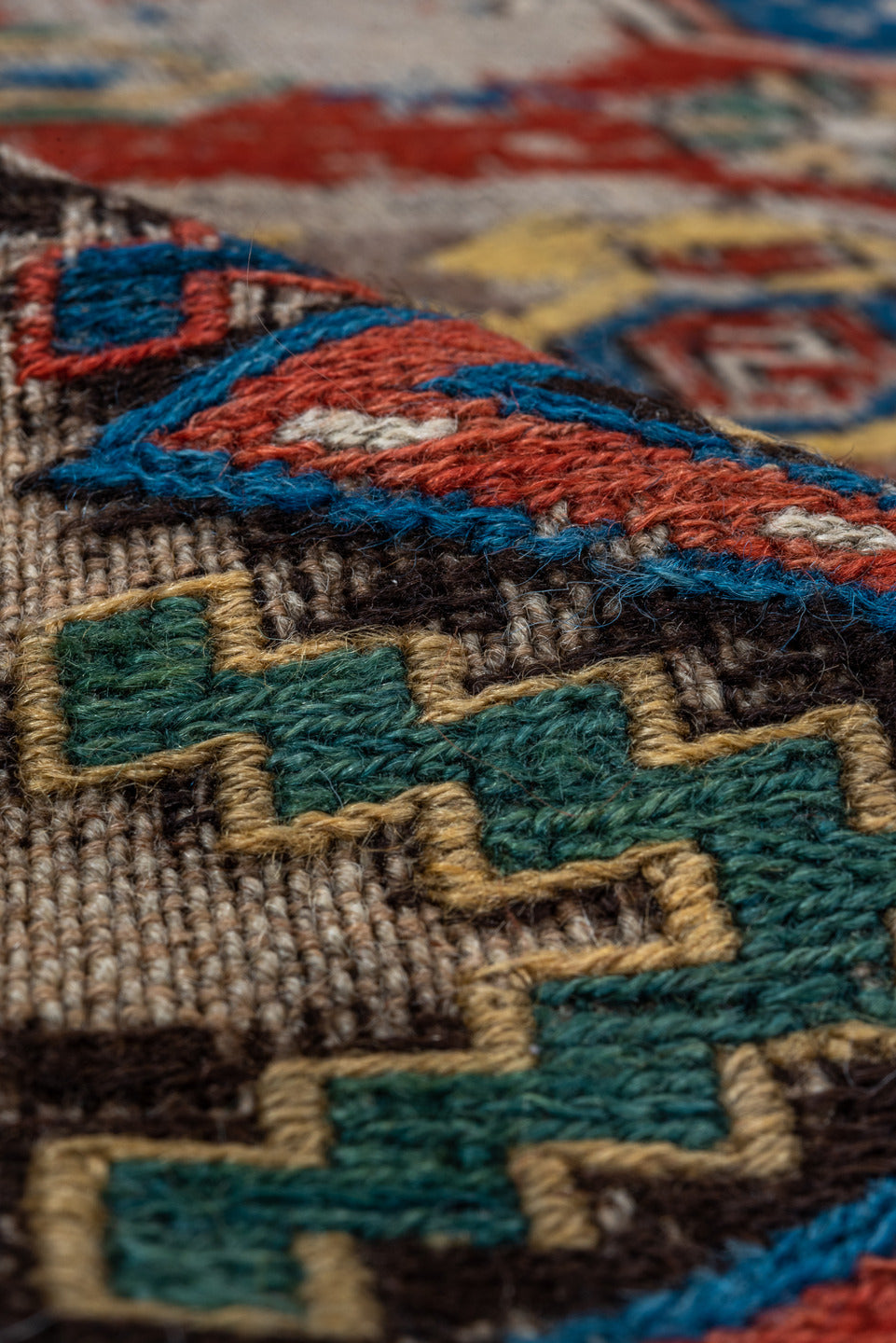 6' x 7' one-of-a-kind handmade antique Sumak rug. Color palette: ivory, indigo, rust, crimson, gold, charcoal, saffron, teal