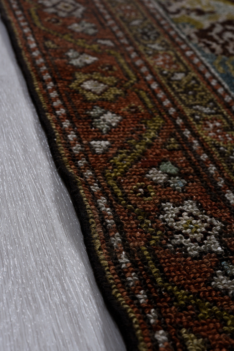 2' x 12' one-of-a-kind handmade vintage Malayer runner rug. Color palette: black, blue, brown, gray, light gray, off-white