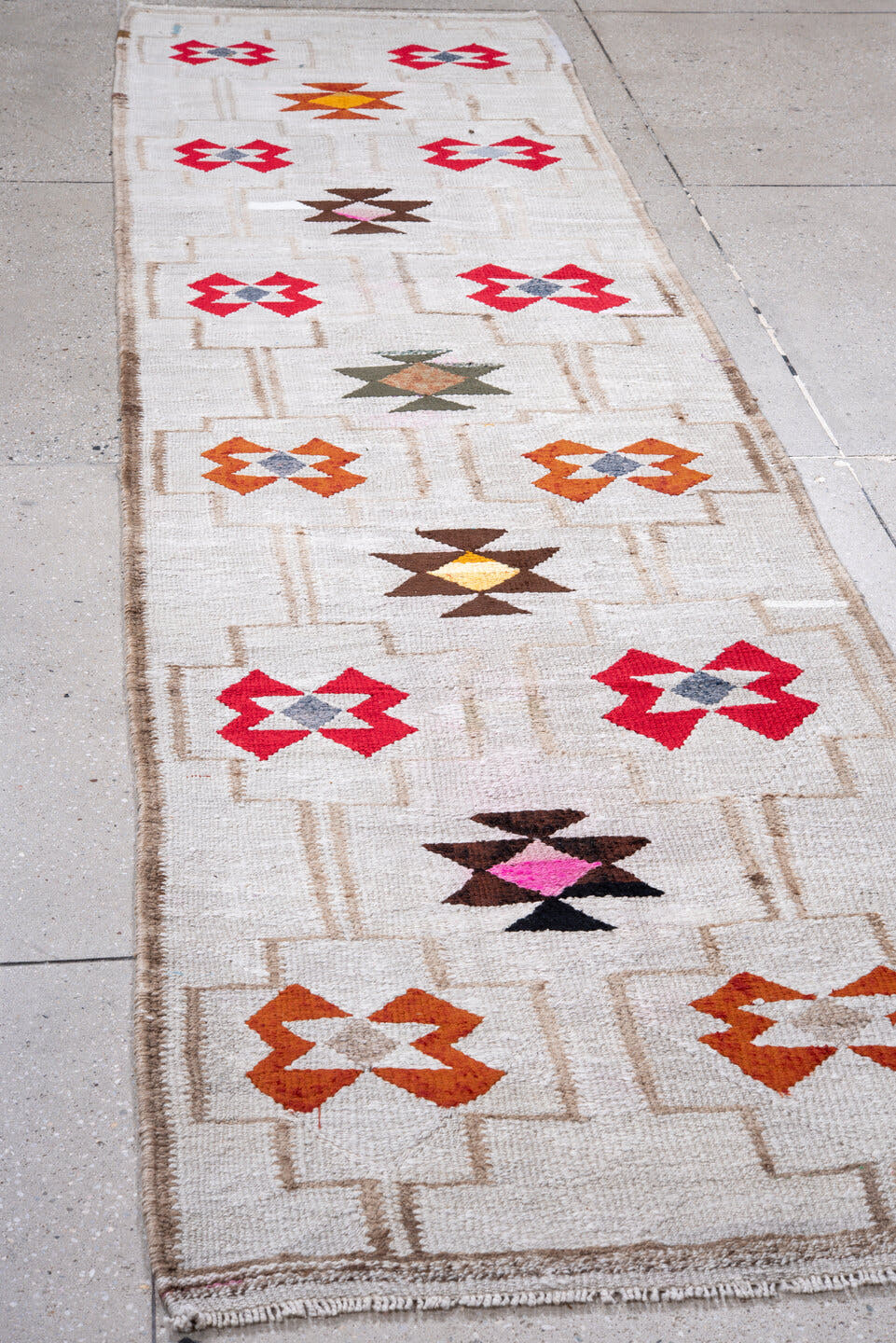 2' x 10' one-of-a-kind handmade antique Kilim runner rug. Color palette: ivory, crimson, rust, taupe, brown, gold, gray