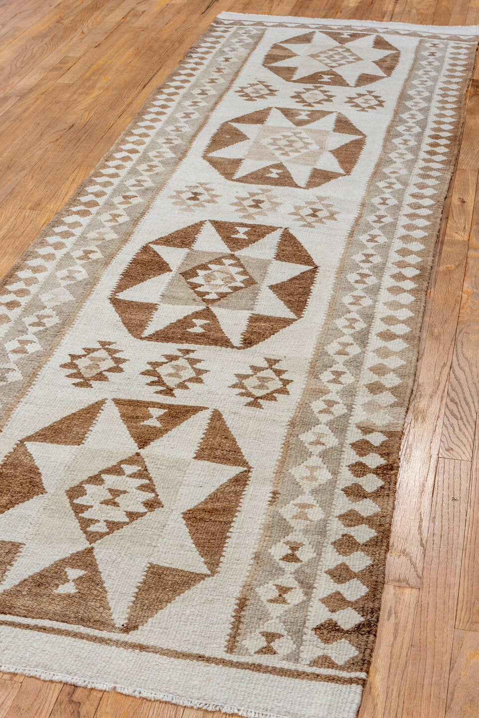 3' x 10' one-of-a-kind handmade antique Kilim runner rug. Color palette: ivory, camel, taupe, brown, beige, gray