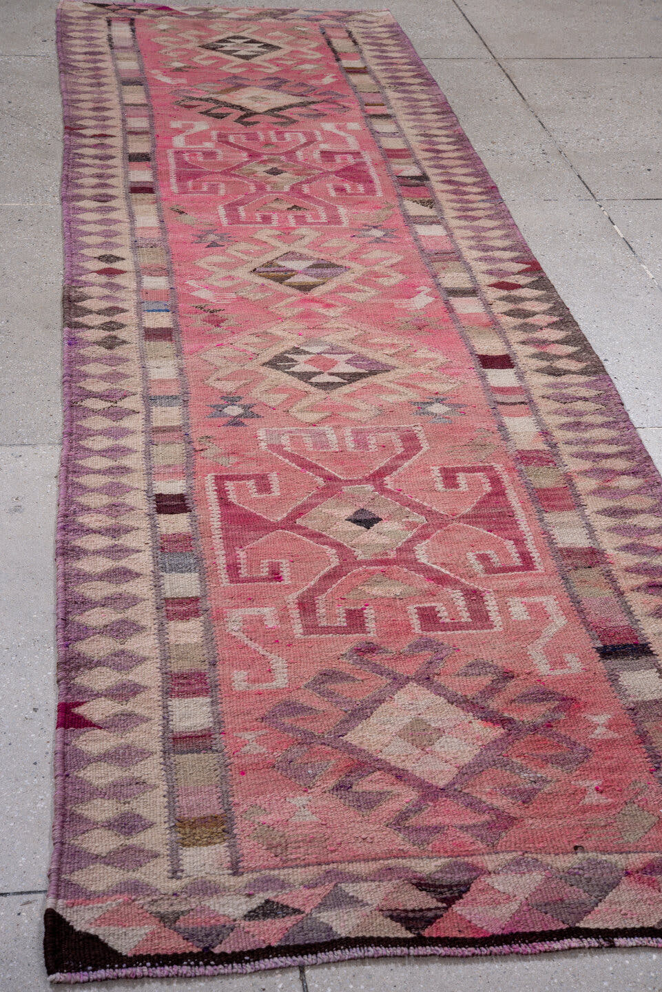 3' x 11' one-of-a-kind handmade vintage Kilim runner rug. Color palette: rose, ivory, lavender, plum, mauve, taupe, charcoal