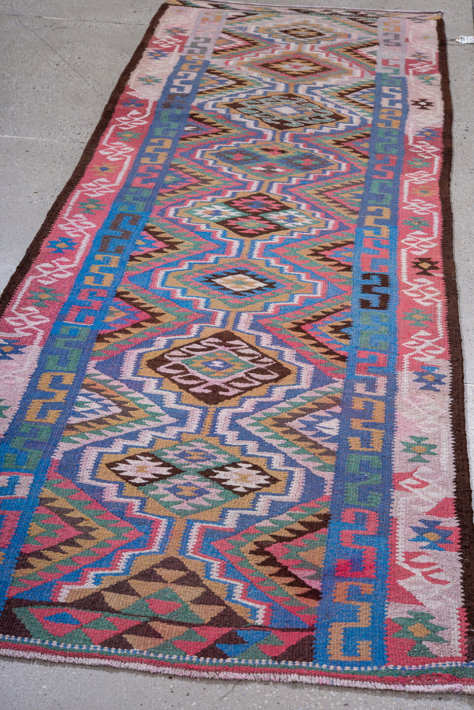 3' x 9' one-of-a-kind handmade antique Kilim runner rug. Color palette: pink, blue, ivory, brown, teal, olive, black