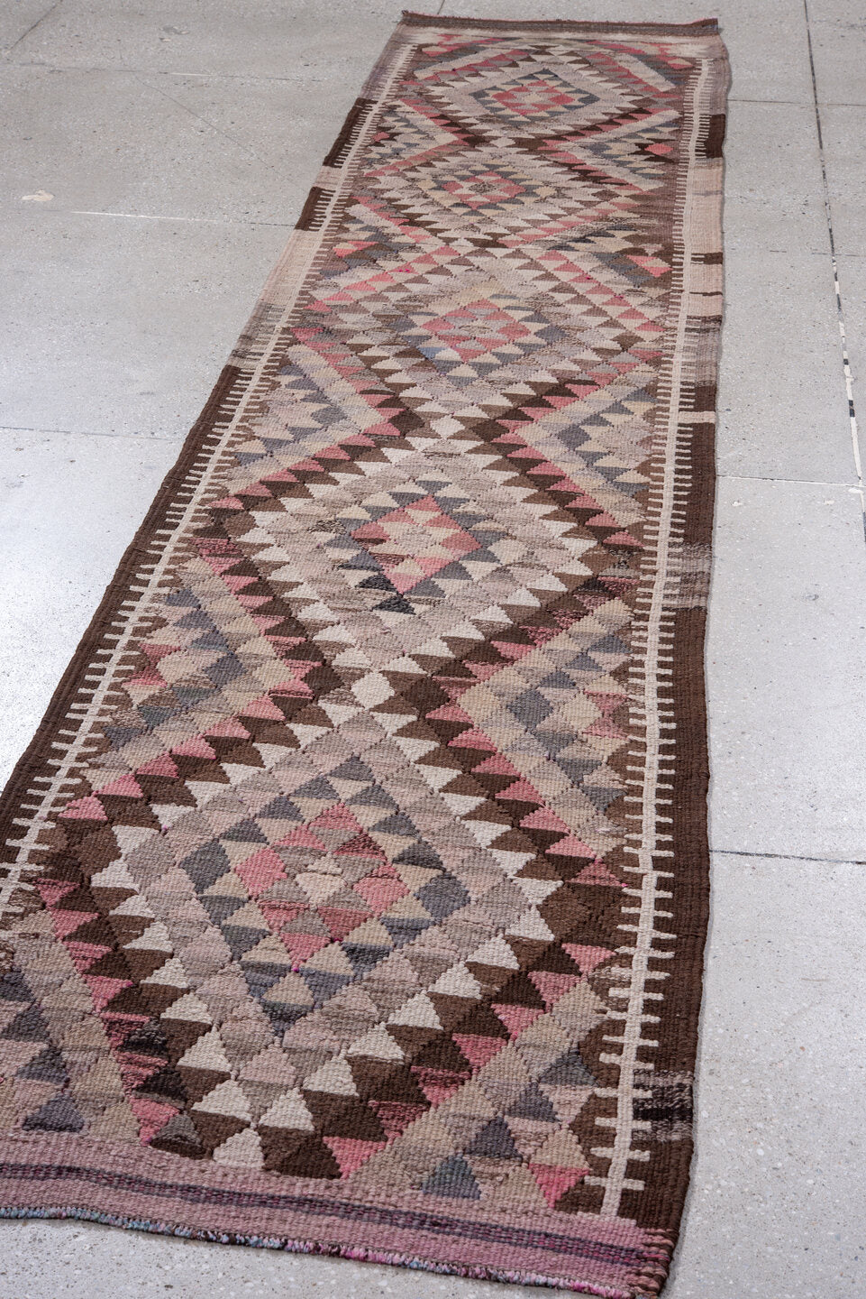 2' x 13' one-of-a-kind handmade vintage Kilim runner rug. Color palette: brown, dim gray, gray, light gray, off-white, pink