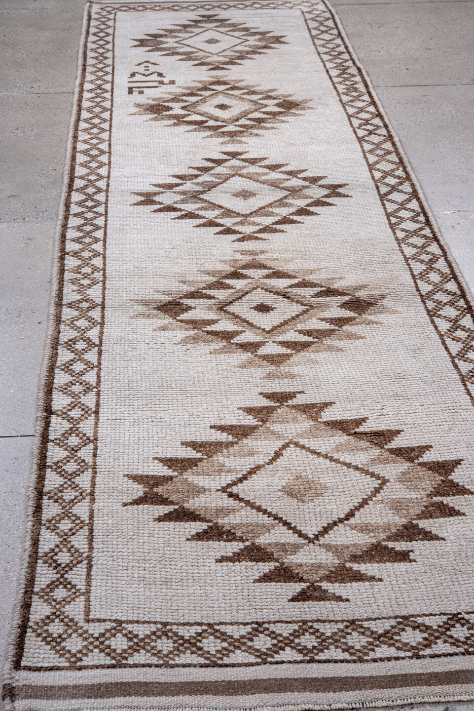 3' x 12' one-of-a-kind handmade vintage Kars runner rug. Color palette: ivory, taupe, brown, beige, gray