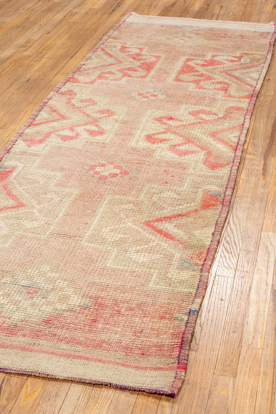 3' x 10' one-of-a-kind handmade vintage Kars runner rug. Color palette: antiquewhite, brown, off-white, orange, pink, red