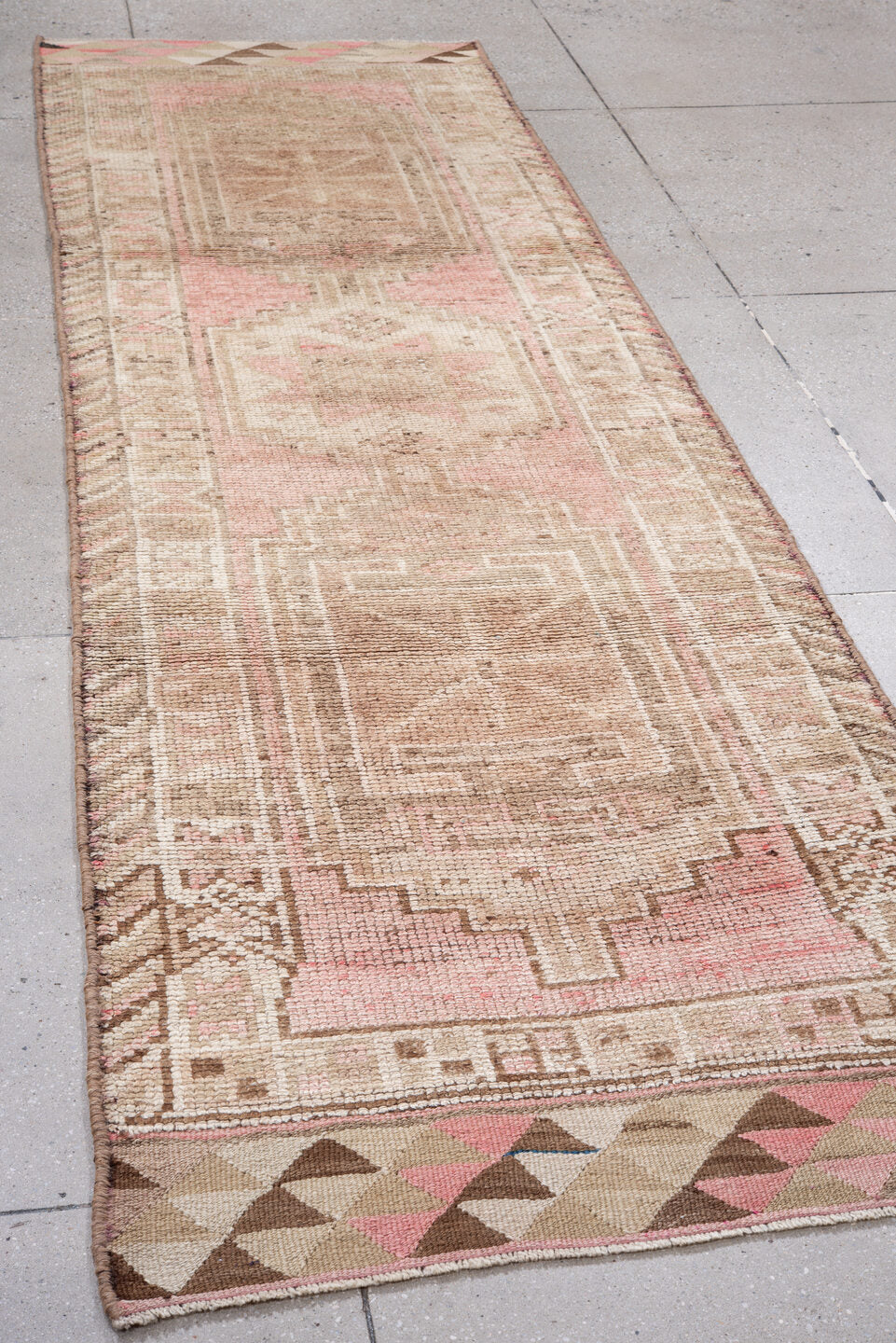 3' x 11' one-of-a-kind handmade vintage Kars runner rug. Color palette: brown, gray, light gray, off-white, pink, red, snow