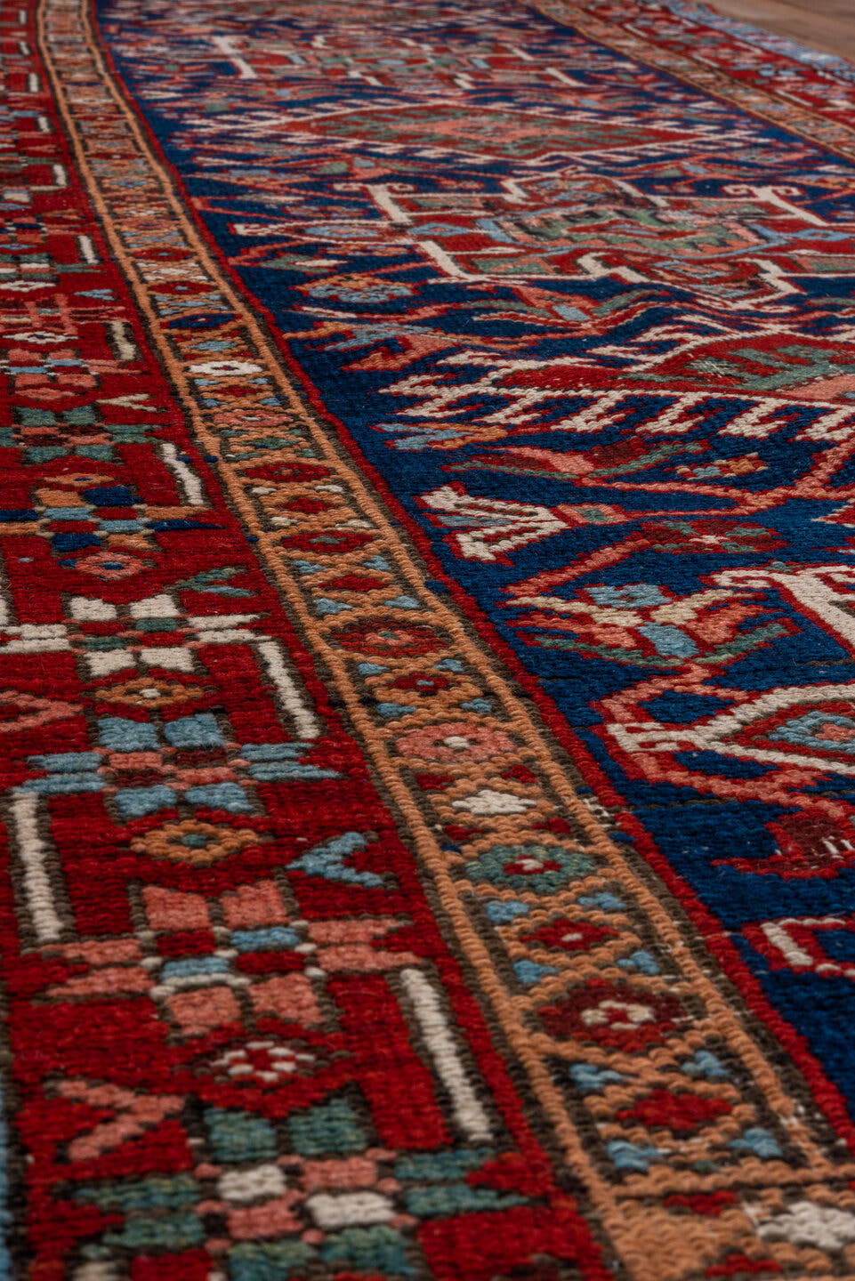 3' x 8' one-of-a-kind handmade antique Karaje runner rug. Color palette: navy, rust, sky blue, ivory, terracotta, sage