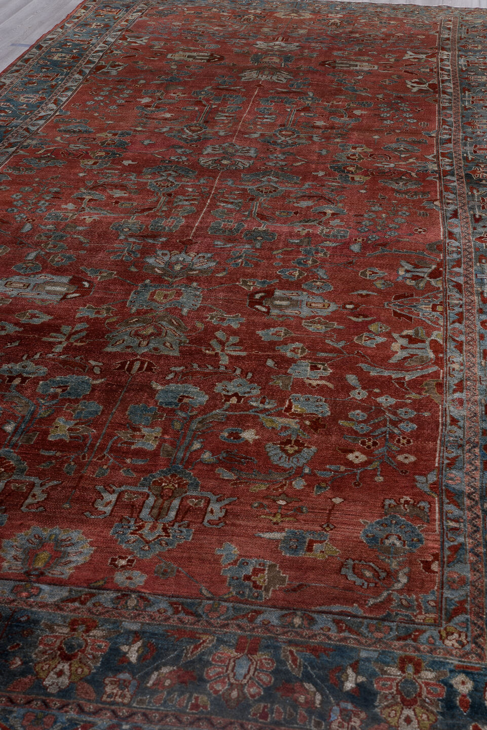 7' x 16' one-of-a-kind handmade antique Lilian rug. Color palette: rust, blue, ivory, slate, burgundy, camel, terracotta