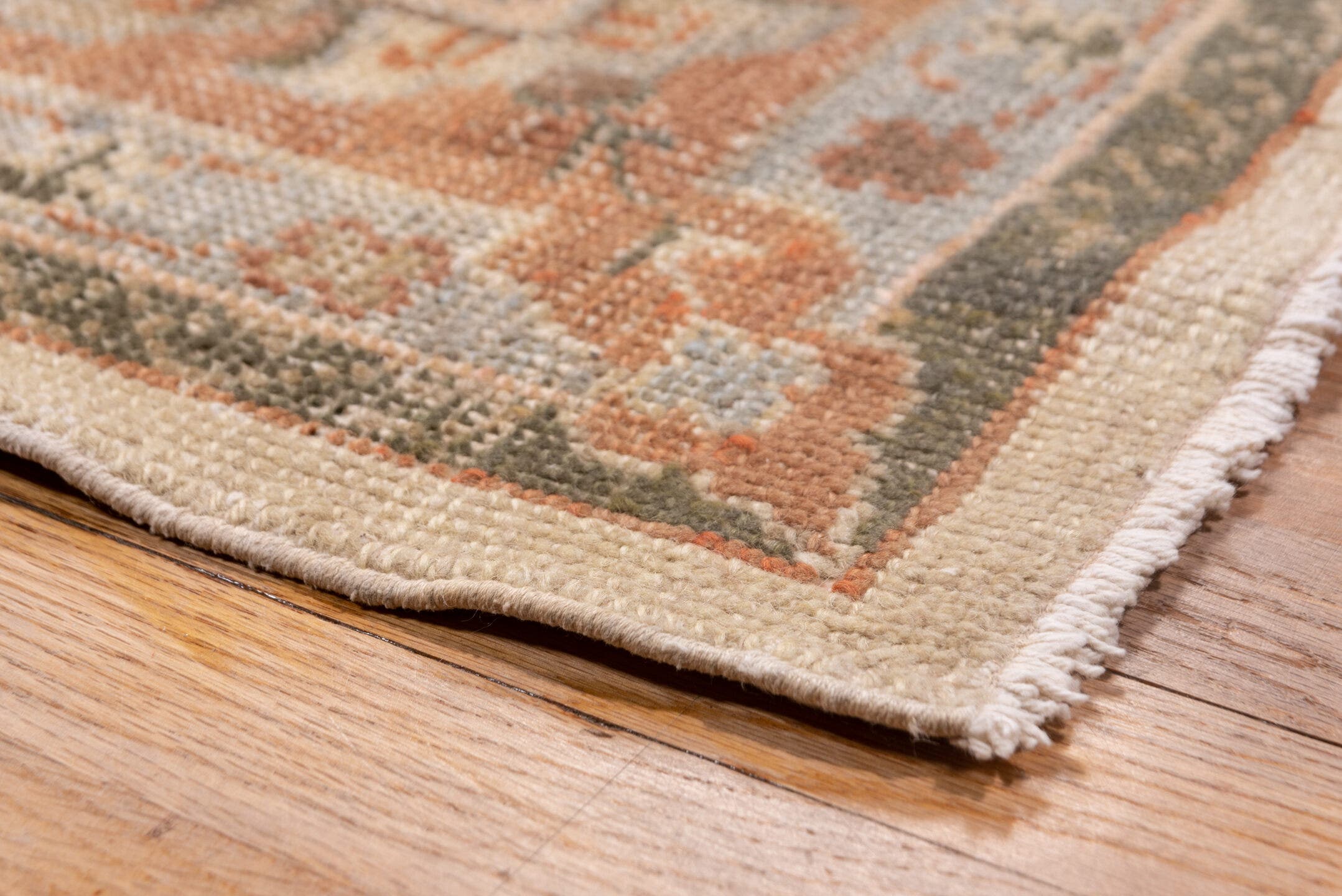 13' x 20' one-of-a-kind handmade antique Oushak oversize rug. Color palette: ivory, peach, taupe, sage, camel, terracotta