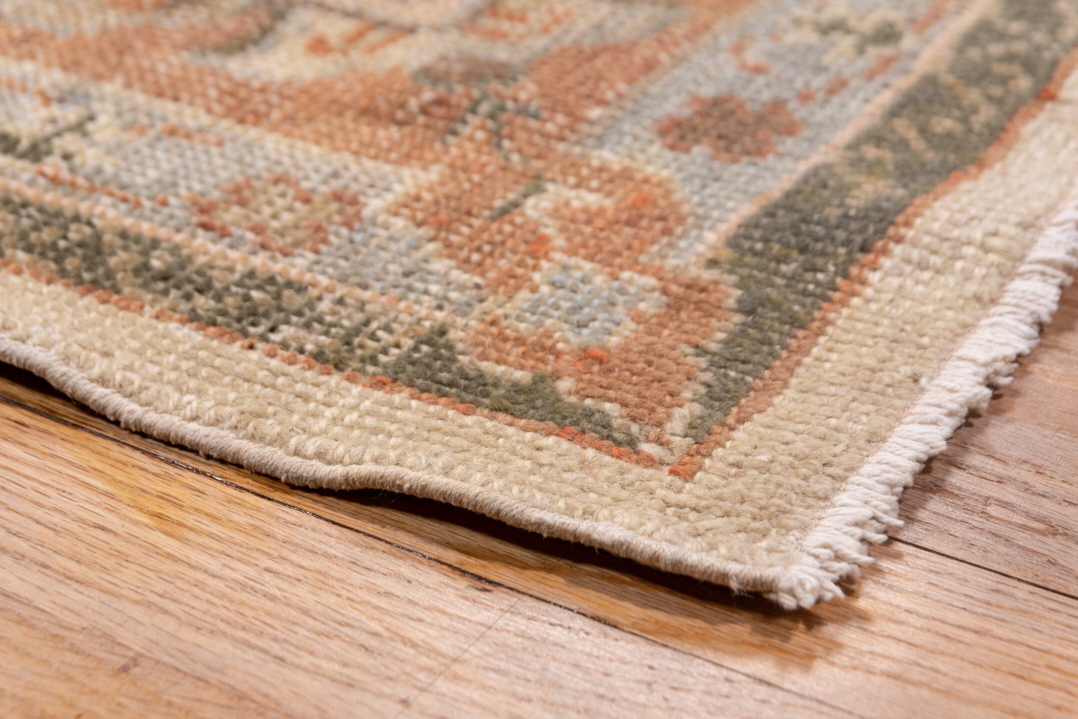 13' x 20' one-of-a-kind handmade antique Oushak oversize rug. Color palette: ivory, peach, taupe, sage, camel, terracotta