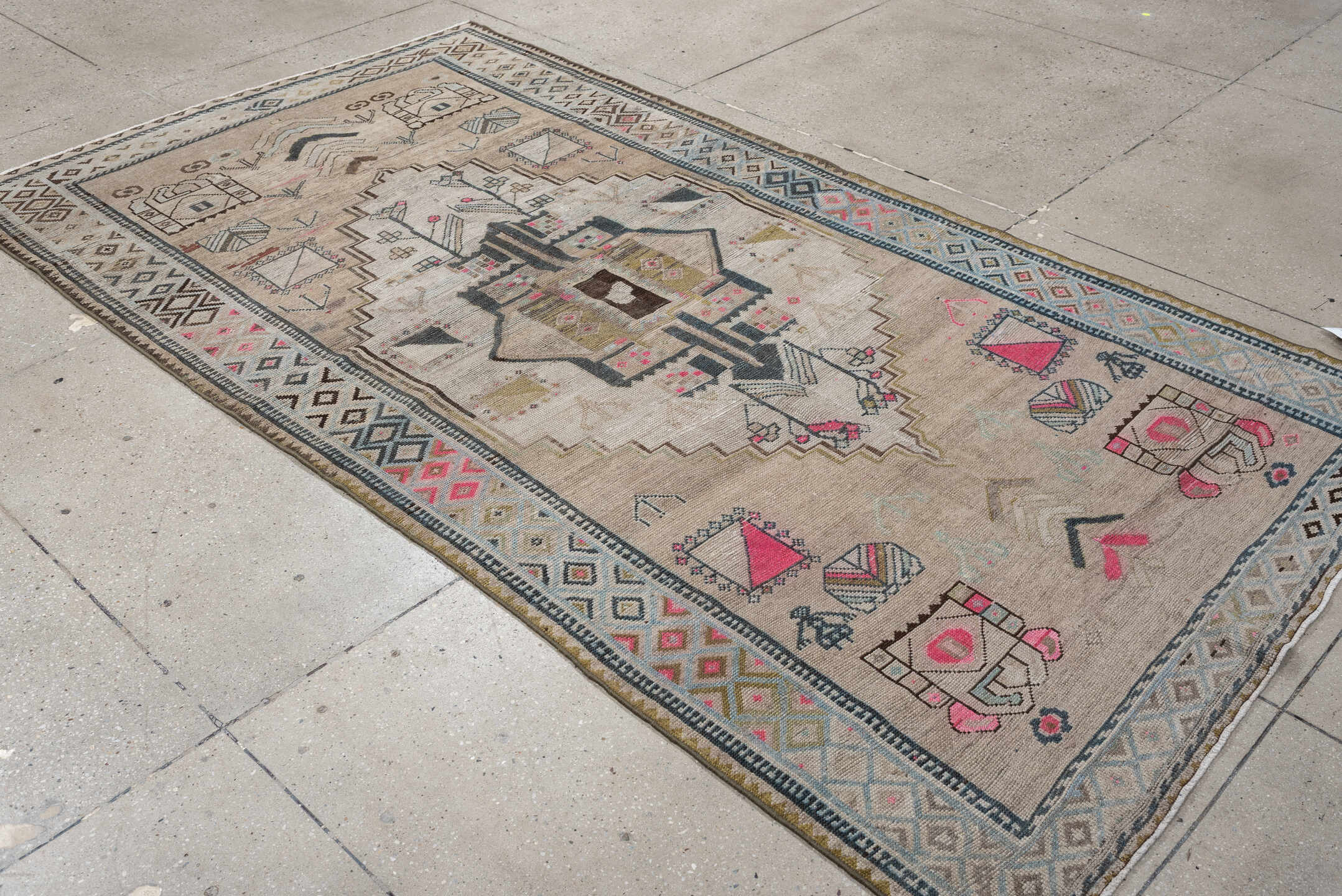 4' x 8' one-of-a-kind handmade vintage Gabbe medium size rug. Color palette: taupe, ivory, charcoal, sky blue, fuchsia