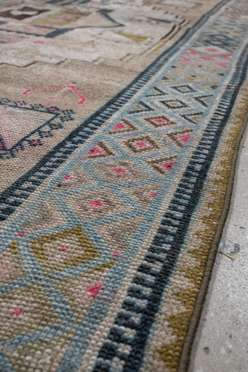 4' x 8' one-of-a-kind handmade vintage Gabbe medium size rug. Color palette: taupe, ivory, charcoal, sky blue, fuchsia