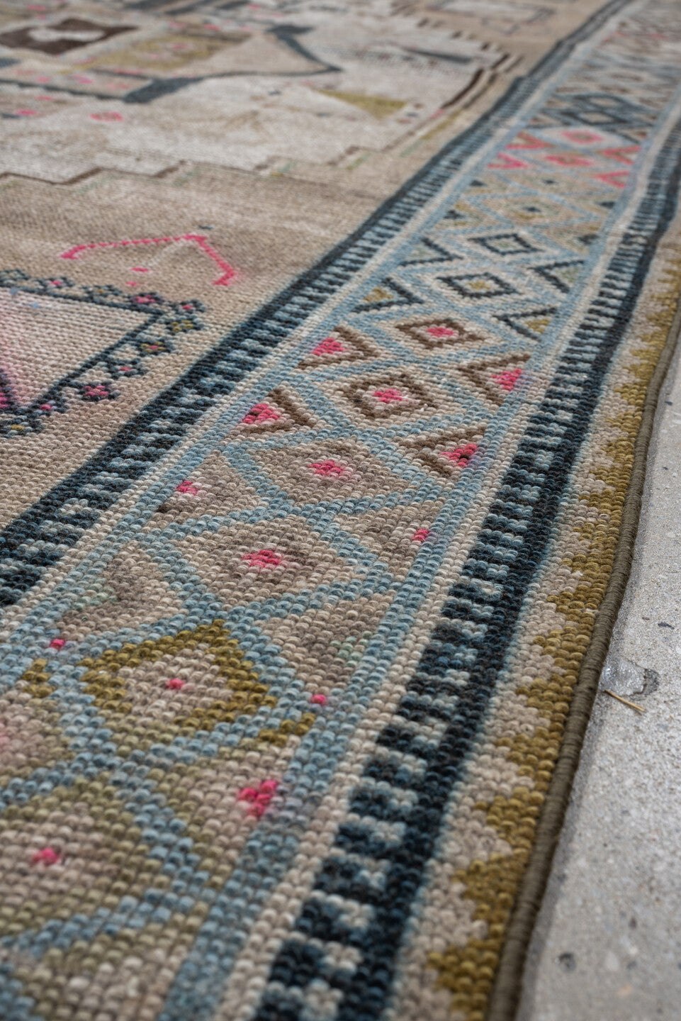 4' x 8' one-of-a-kind handmade vintage Gabbe medium size rug. Color palette: taupe, ivory, charcoal, sky blue, fuchsia