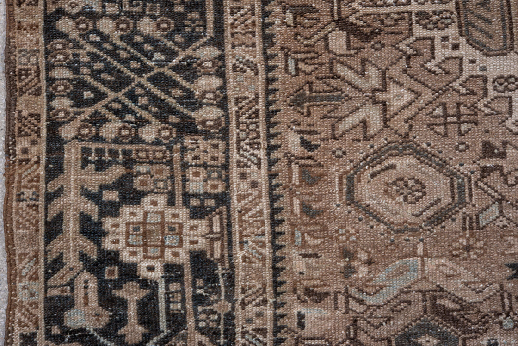 4' x 6' one-of-a-kind handmade vintage Karaje small size rug. Color palette: gray, black, brown, light gray, pink, off-white