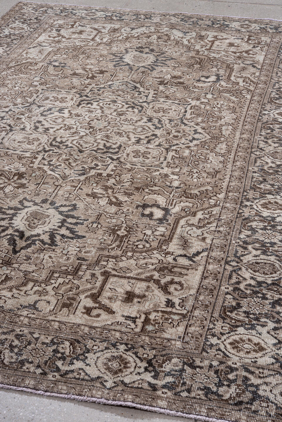 6' x 9' one-of-a-kind handmade antique Heriz medium size rug. Color palette: taupe, ivory, charcoal, brown, beige, gray