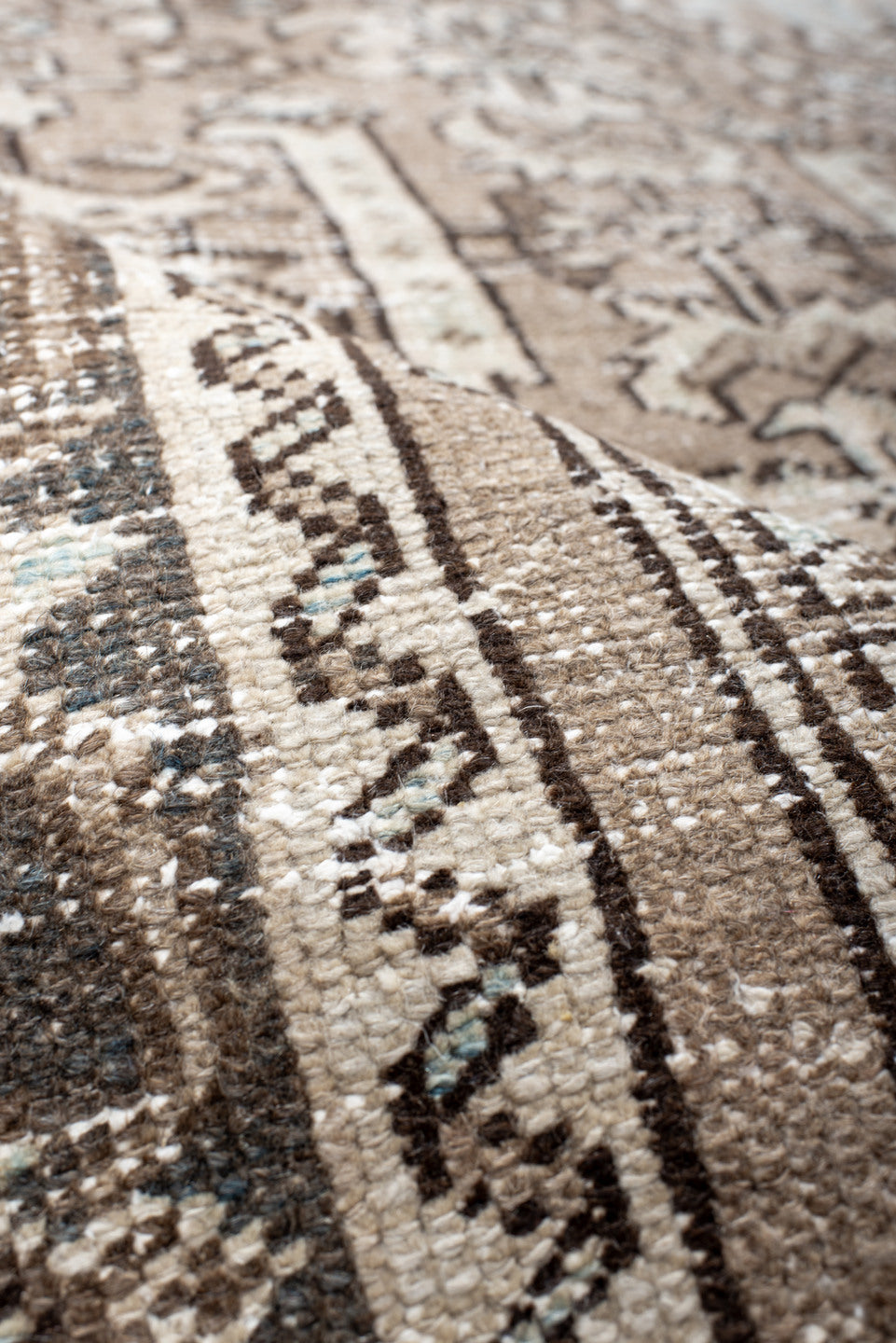 5' x 8' one-of-a-kind handmade antique Heriz medium size rug. Color palette: taupe, ivory, charcoal, brown, pale blue, cream