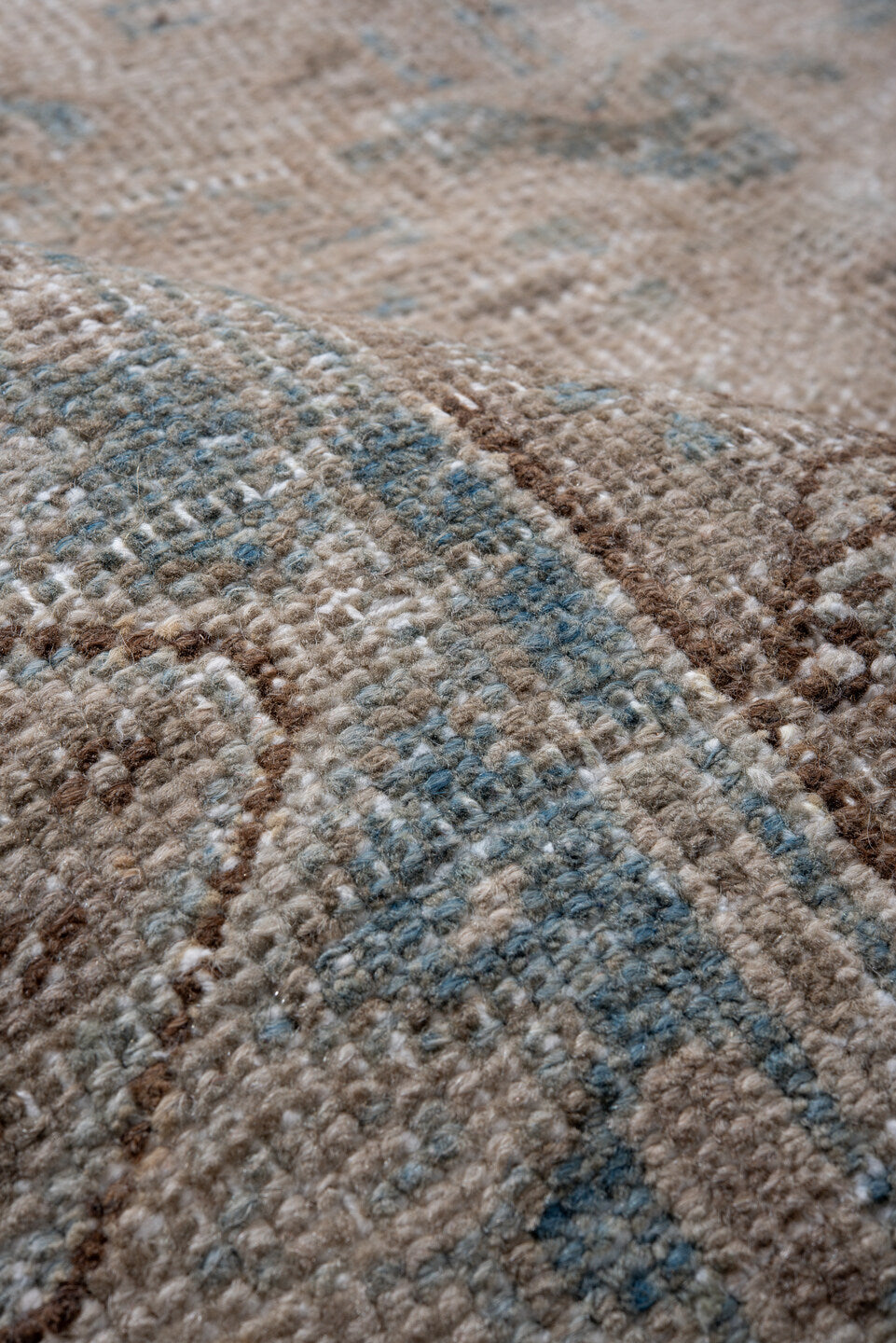 7' x 10' one-of-a-kind handmade antique Heriz large size rug. Color palette: ivory, sky blue, taupe, beige, camel, brown