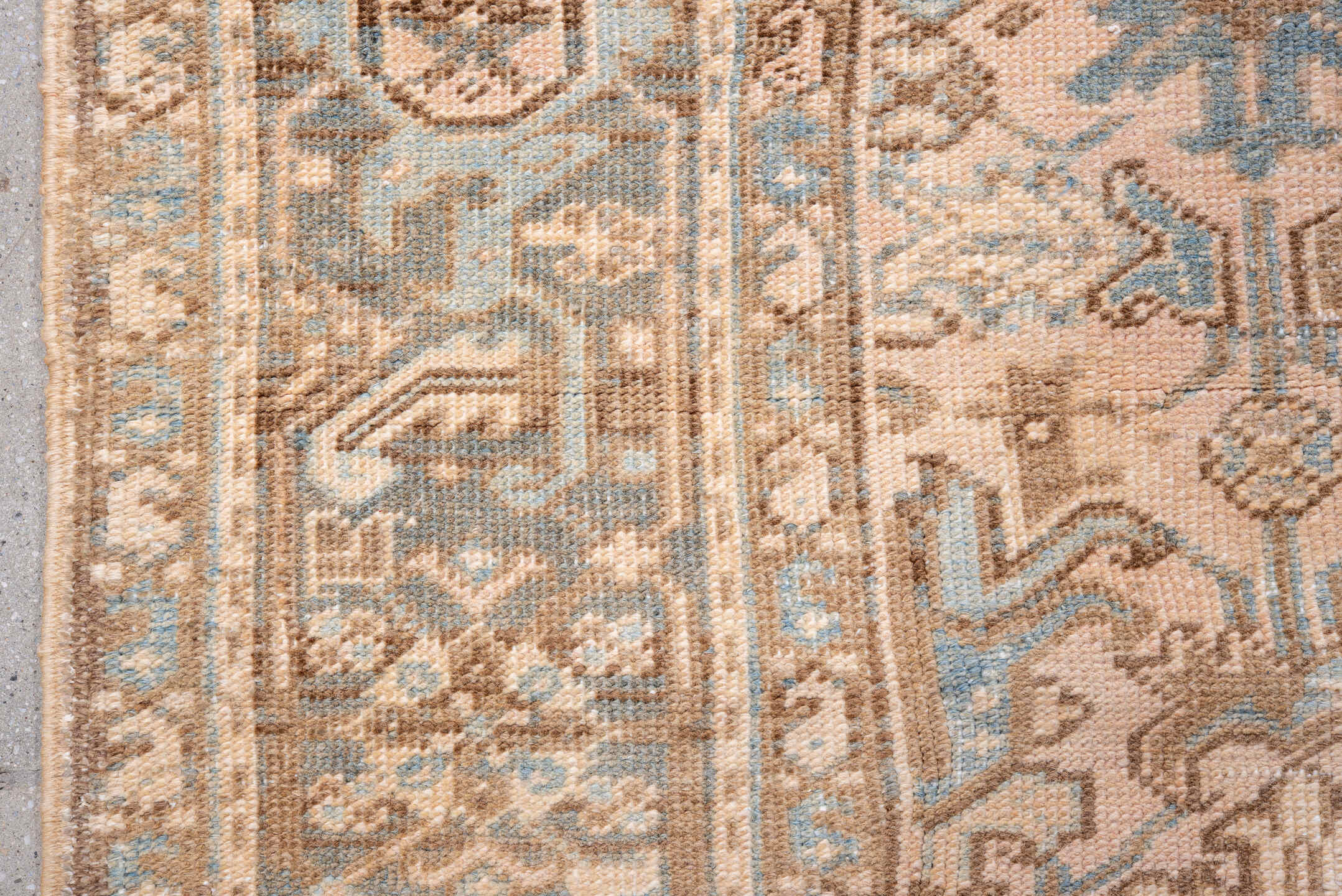7' x 9' one-of-a-kind handmade antique Heriz rug. Color palette: ivory, taupe, sky blue, brown, camel, slate, beige, gray