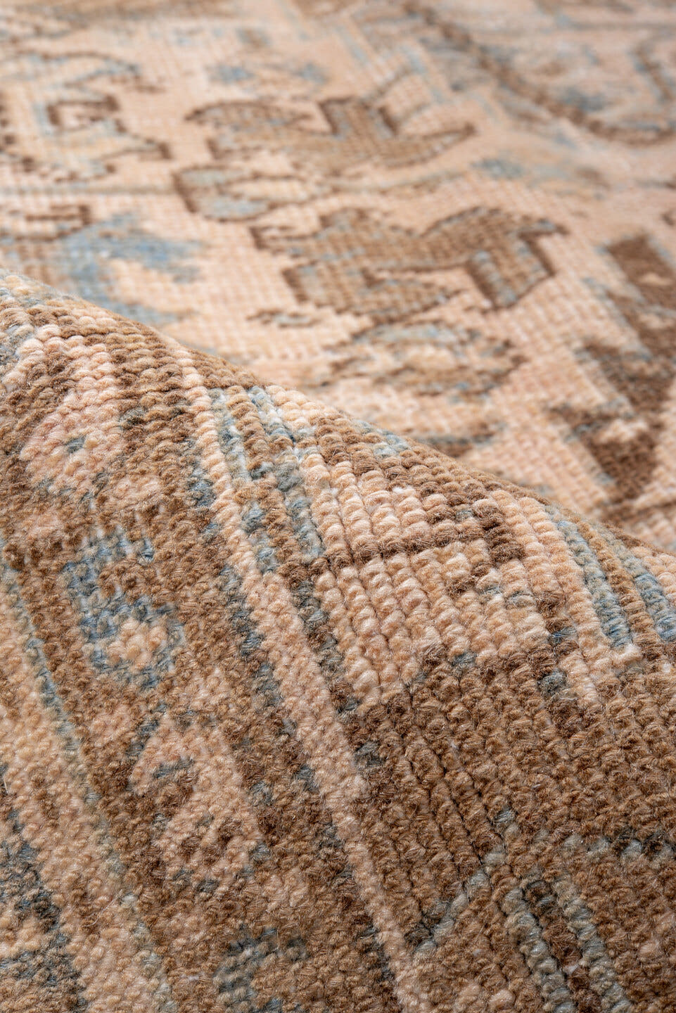 7' x 9' one-of-a-kind handmade antique Heriz rug. Color palette: ivory, taupe, sky blue, brown, camel, slate, beige, gray