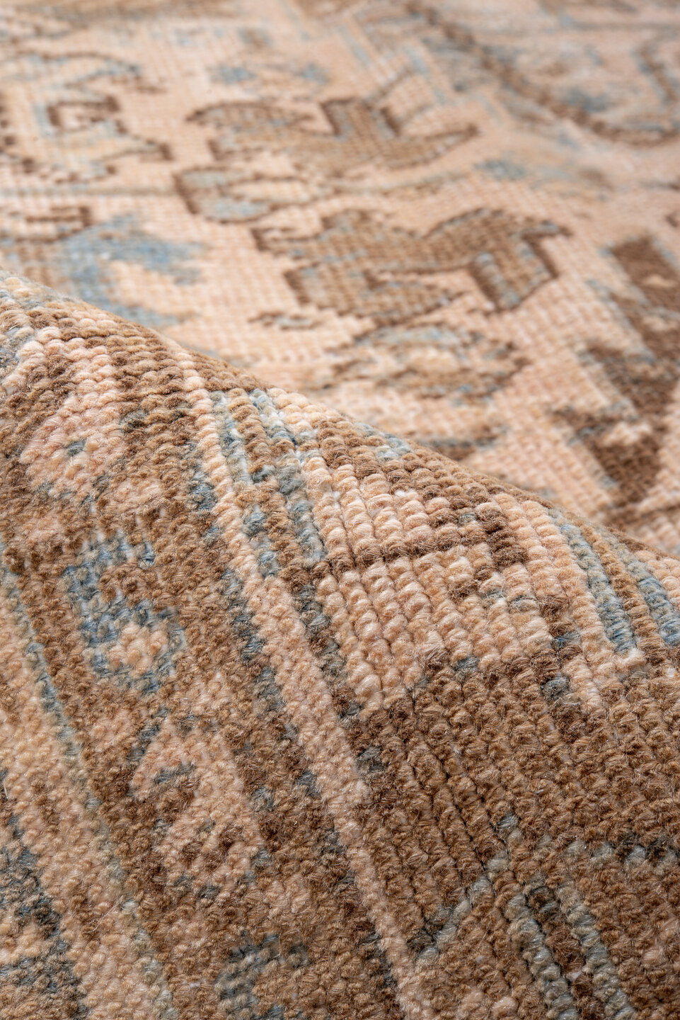 7' x 9' one-of-a-kind handmade antique Heriz rug. Color palette: ivory, taupe, sky blue, brown, camel, slate, beige, gray