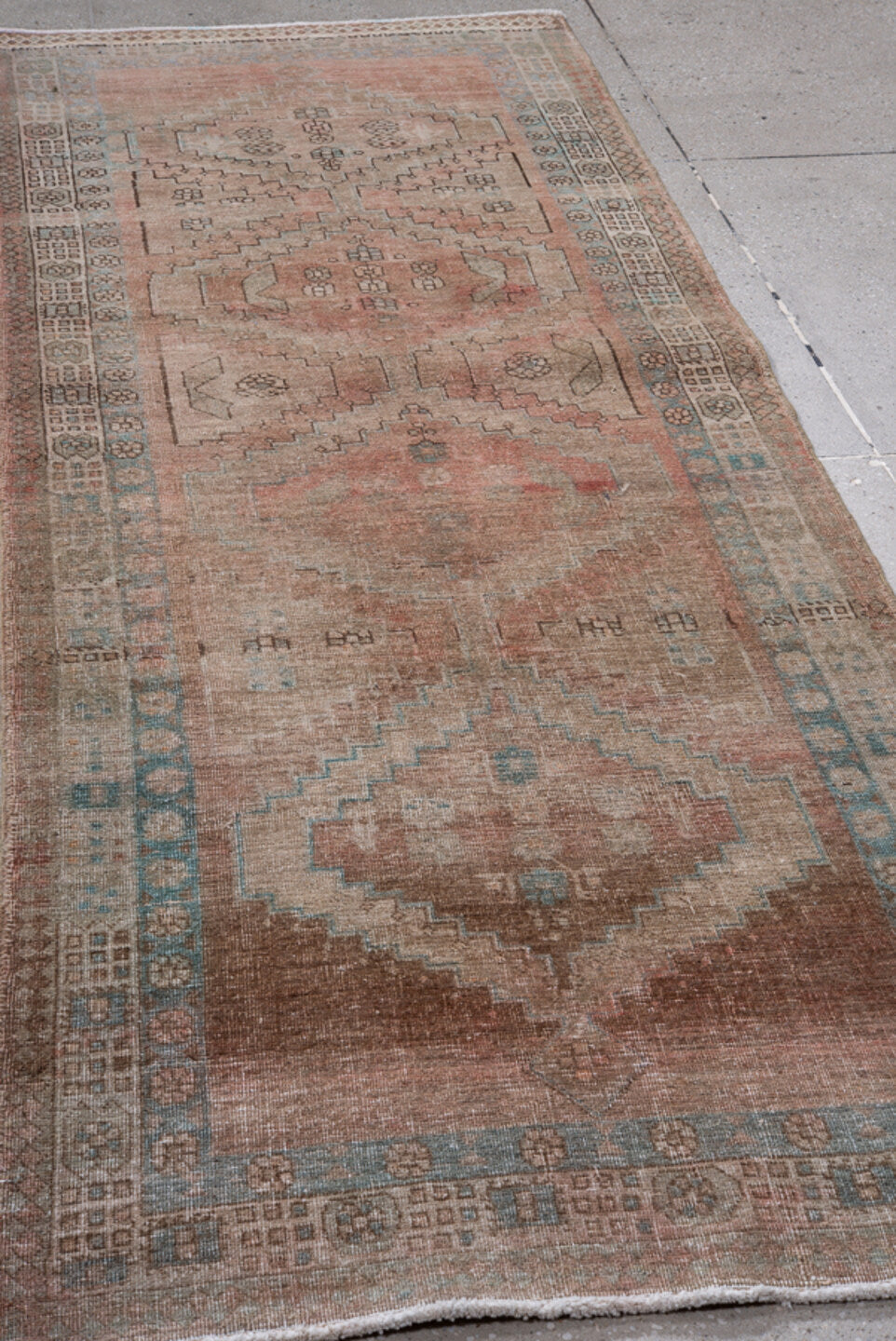3' x 9' one-of-a-kind handmade antique Sarab runner rug. Color palette: rose, ivory, taupe, sky_blue, brown, camel, charcoal